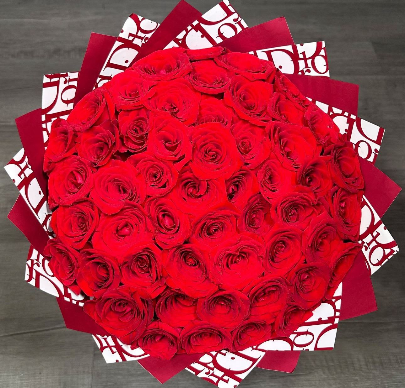 Passion Red Boquete  - Boquete of roses ranges from 2 dozen, 3 dozen up to 4 dozens. wrapped in beautiful Red Dior paper. perfect for birthday gift, anniversary or any other special occasion