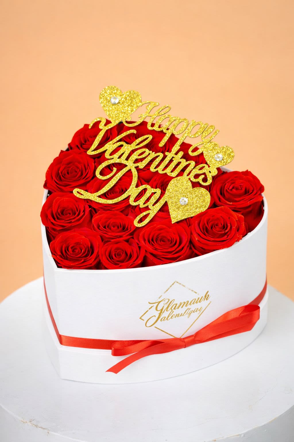 Eternal Amour Luxe (PRESERVED ROSES) - refined heart-shaped arrangement featuring premium PRESERVED ROSES, designed to last and symbolize everlasting love. Finished with elegant gold accents, this luxurious piece is a timeless expression of passion and sophistication—perfect for an unforgettable Valentine’s statement.