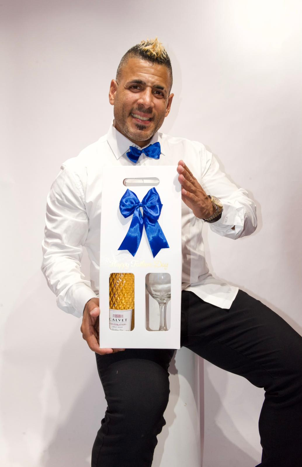 wine white bag gift set - white gift bag with wine bottle and a wine glass. with a blue ribbon to top it off