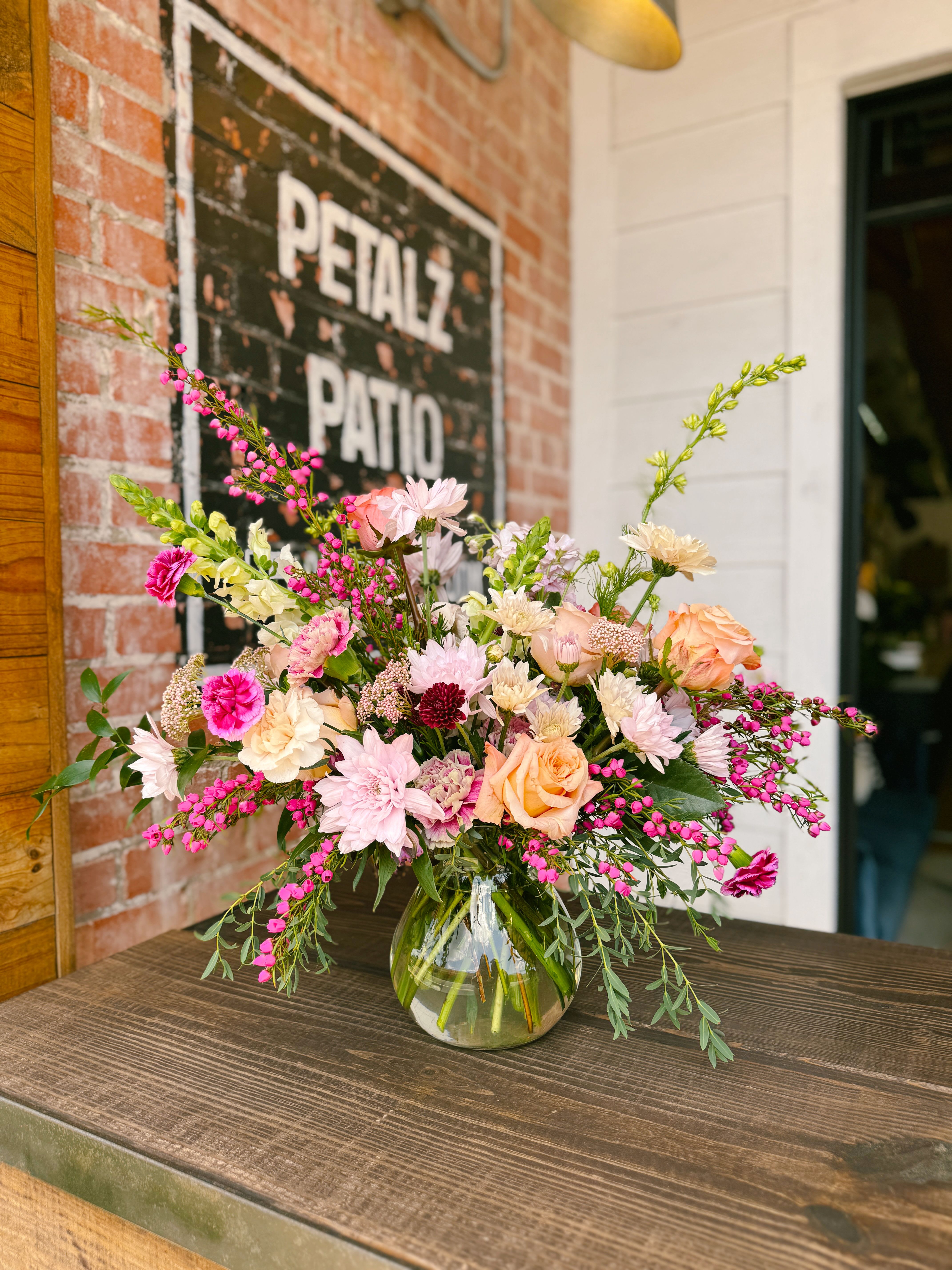 Golden Hour - This arrangement is uniquely crafted with bright and fresh florals. Arrangement and vase may vary depending on product availability.