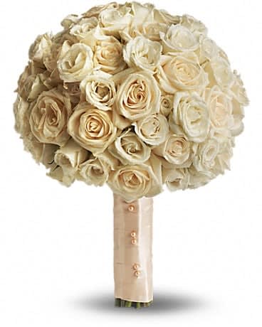 Blush Rose Bouquet - Add a classic touch to your special day with this simply gorgeous bouquet of crÃ¨me roses, wrapped with creamy satin ribbon. A generous bouquet of crÃ¨me roses bound with a satin ribbon. 