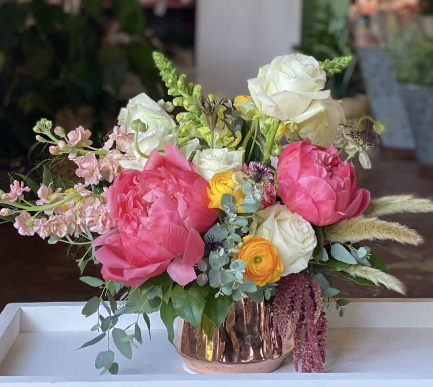 Sweet Pea - This arrangement is uniquely crafted with fresh pinks and whites. Florals may vary depending on product availability.