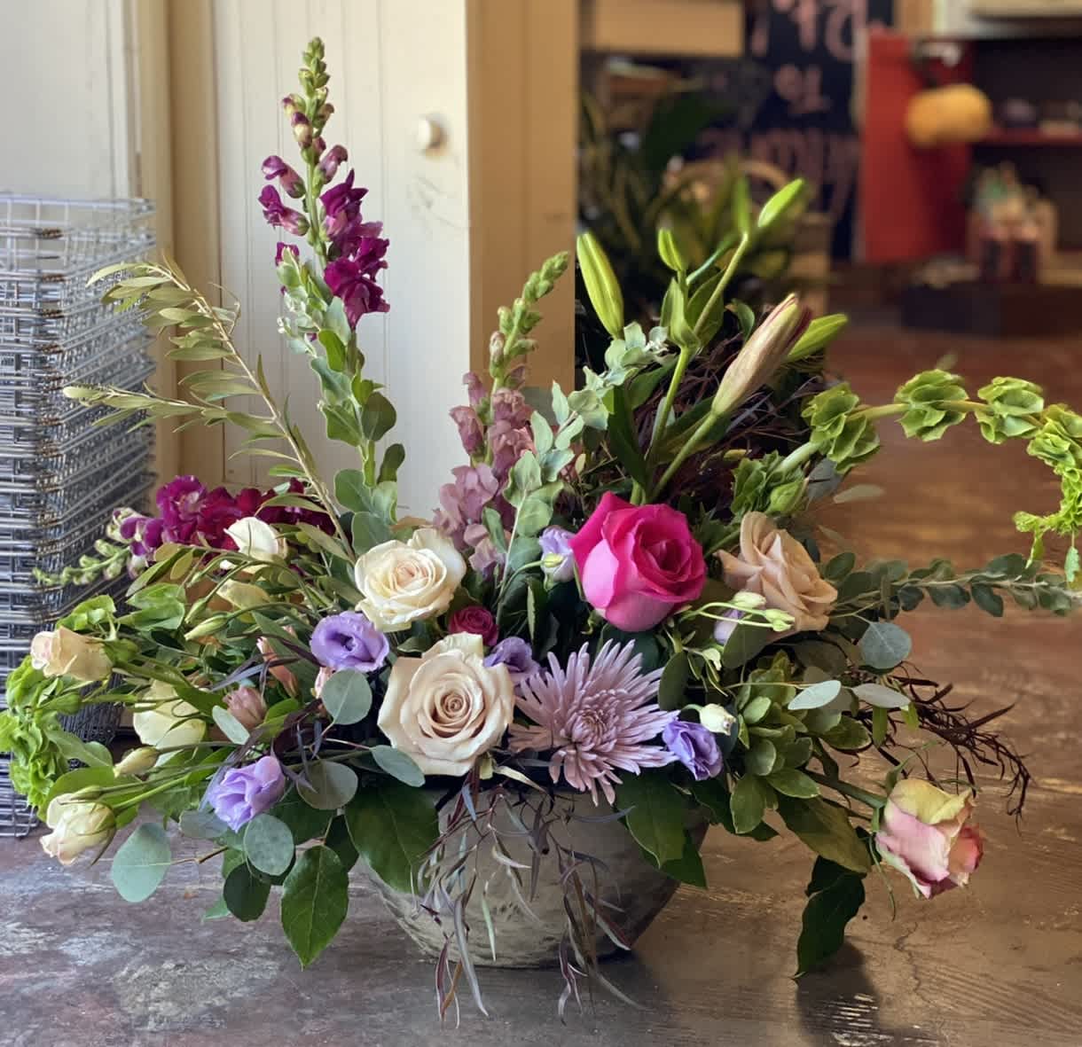 The Bombshell  - This arrangement is uniquely crafted with elegance and love. Florals may vary depending on product availability.