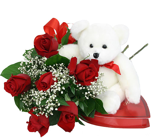 Valentine's Delight - A romantic bouquet of six premium red roses with baby's breath and matching red bow is presented with a box of delicious chocolates and a cuddly plush bear. Wow! 