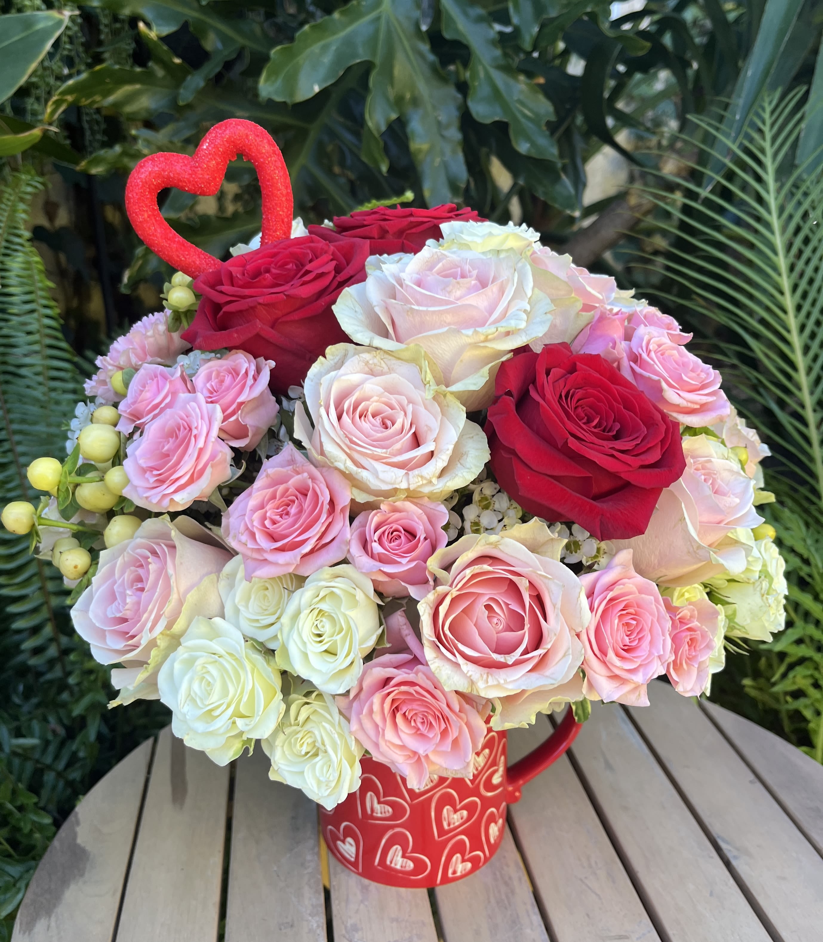 Happy Valentine's Day  - Personally crafted, fresh, seasonal bouquet tastefully arranged in a mug. The specific arrangement delivered will be determined by the designer. If you would like to request specific flower types and colors, please place your order in the Custom Arrangements section where you can specify those details or give us a call to discuss your ideas. 