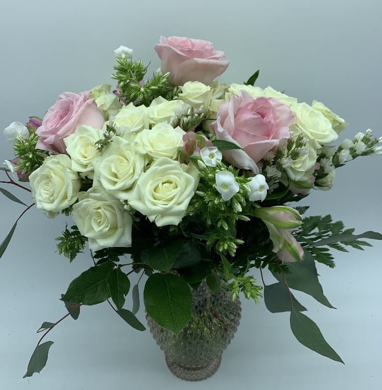 ANNIE  $85/100/115 - This bouquet is a sweet way to show someone you care. Delicate spray roses in white, pink garden roses and white Phlox.  PS: Don't forget to add a fragrant gift candle and some chocolates!  