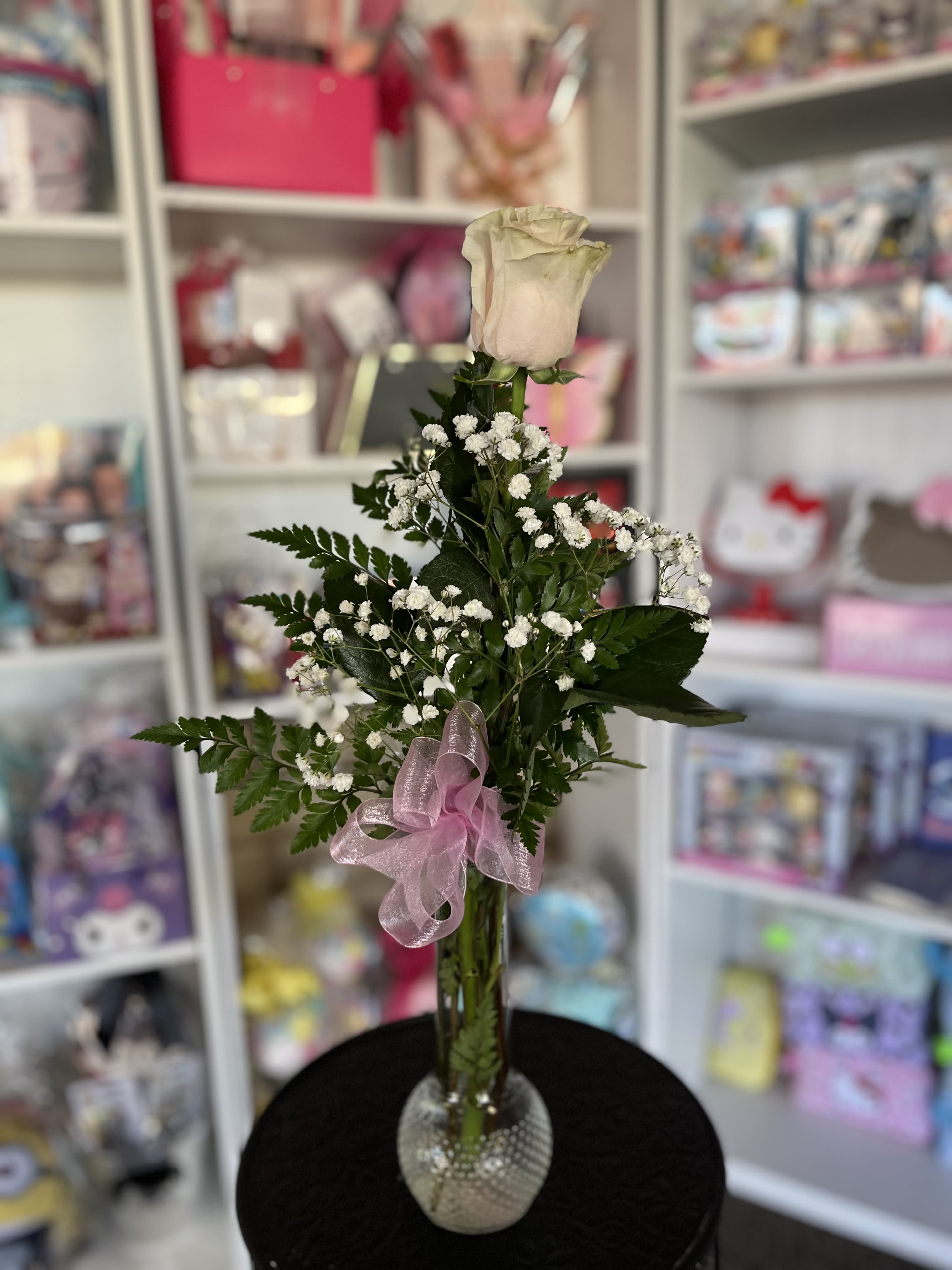 Single Soft Pink Rose  - fresh soft pink rose in bud vase setting 