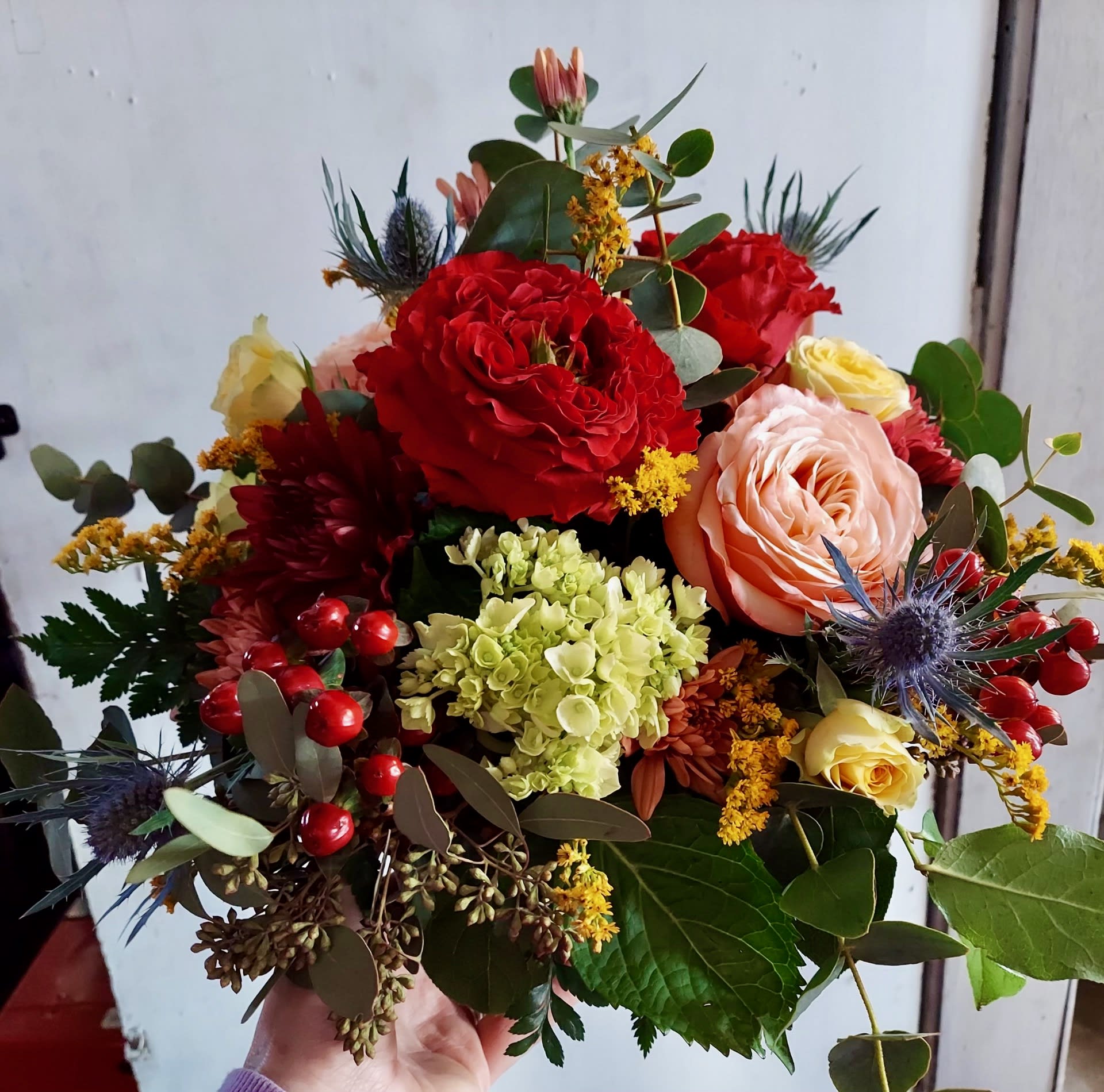 A Lively Bouquet - This vibrant mix of colors, textures and variety of florals is a lively bouquet to express your love, sympathy, congratulations or just because.  This lively bunch is sure to spread cheer!