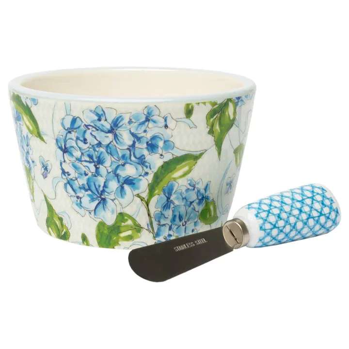 Blue Hydrangea Bowl and Spreader - Painterly blue hydrangeas bloom across this dolomite bowl, paired with a coordinating spreader featuring a stainless-steel blade for effortless serving. Ideal for dips, soft cheeses, and jams, the set brings a fresh floral note to any tabletop. Approximate dimensions are 4.75 x 4.75 x 2.75 inches.
