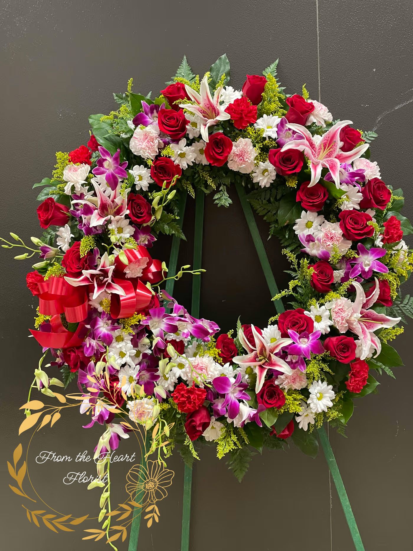 Orchid, Roses and Lilies Wreath (FW17) - This Beautiful wreath made with dendrobium  orchid, red roses and pink lilies . white daisy and greenery .