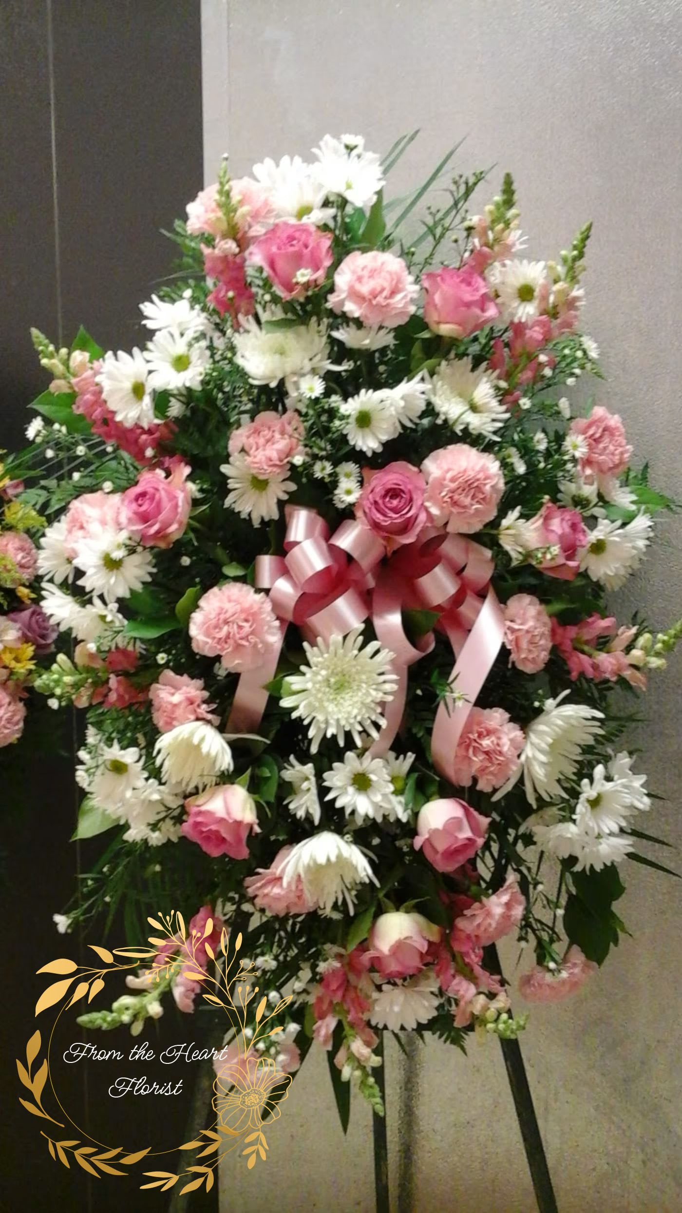 Pink and white standing spray (FS1) - This standing spray make with pink and white colors flower , roses, carnations, daisy and snap dragons