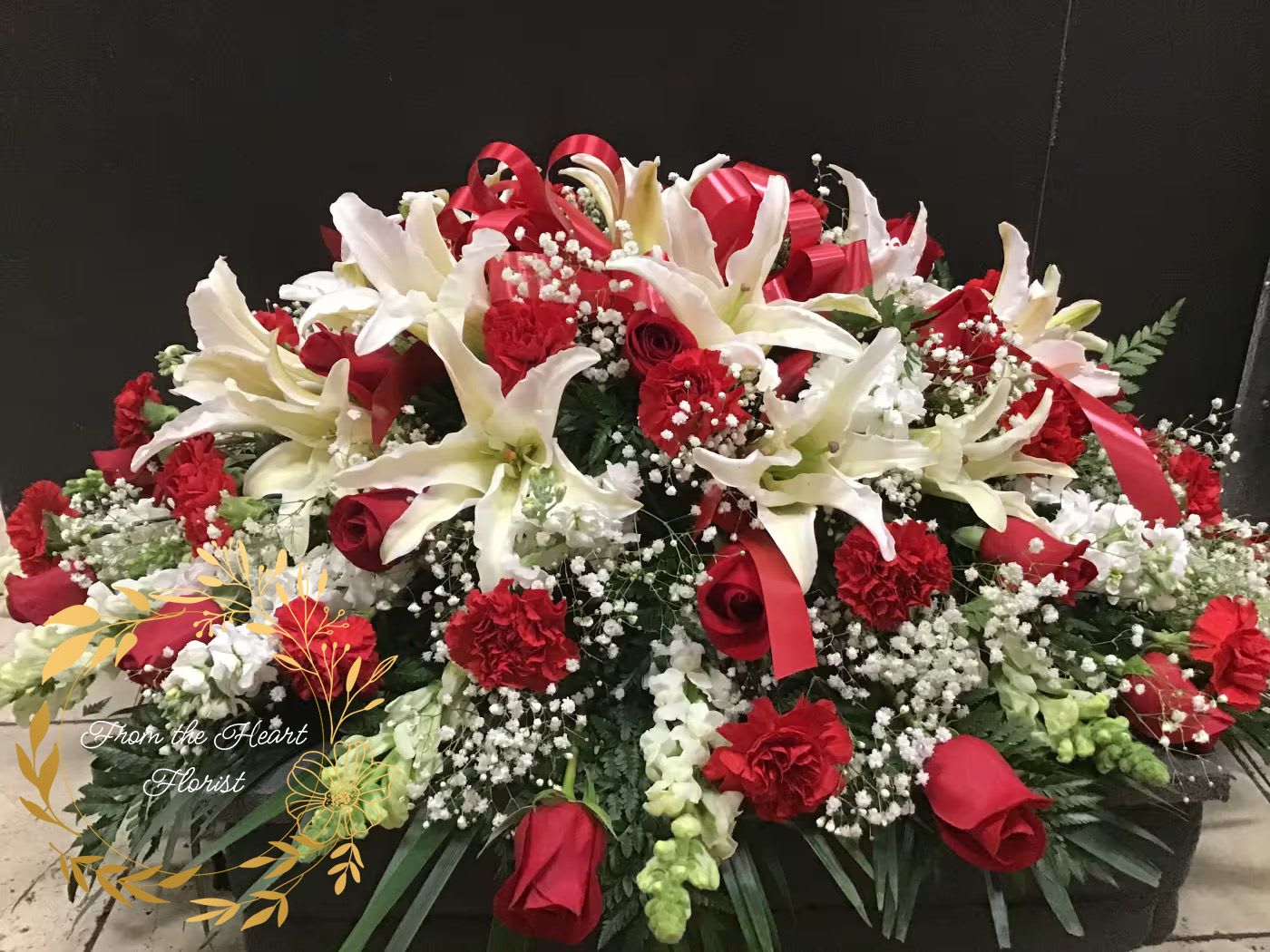 Roses and Lilies Casket (FC9) - This casket make with red roses, white lilies and white snapdragon 