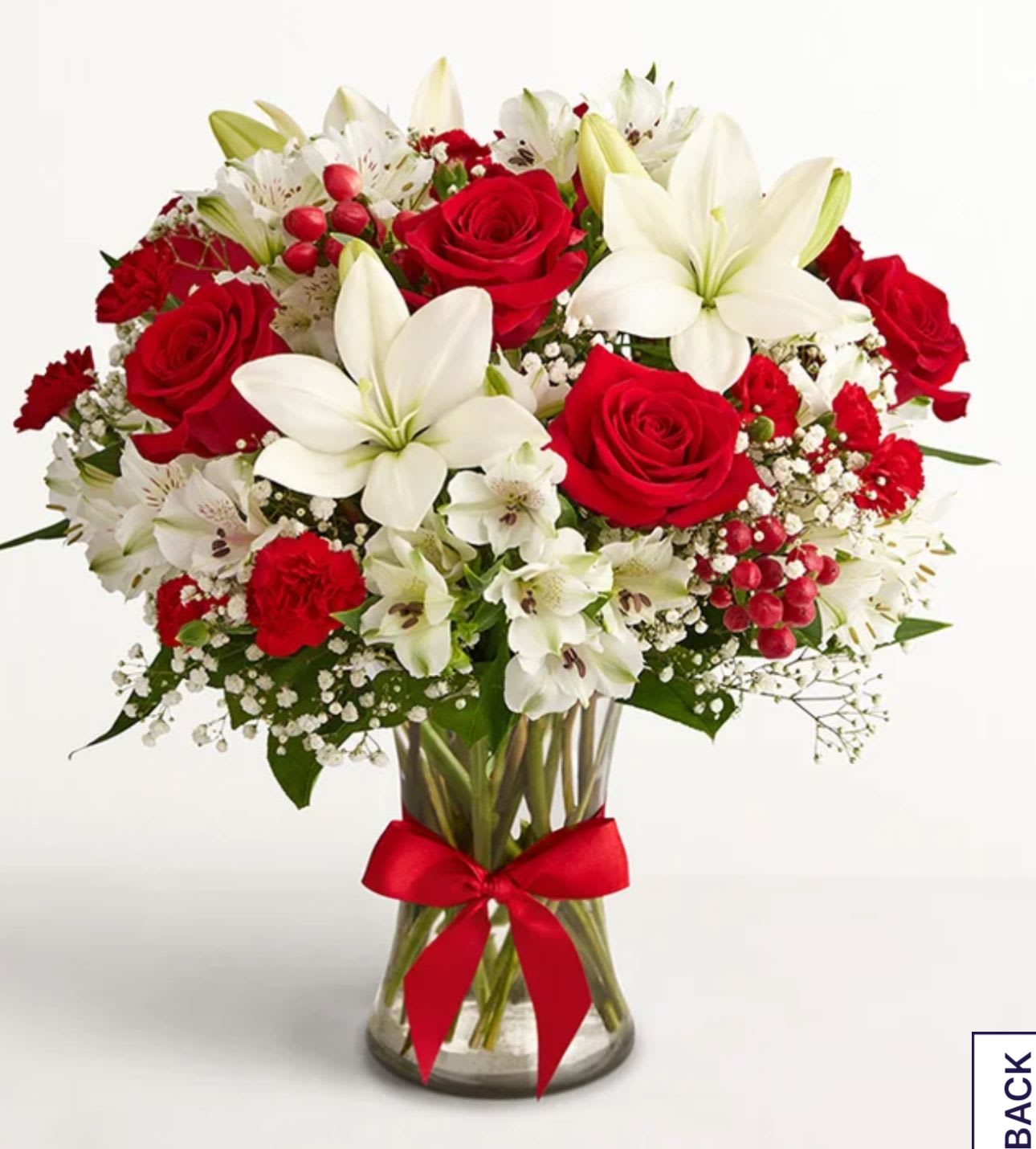 FIELD EUROPEA - EXCLUSIVE The rustic beauty of the European countryside is beautifully captured in our best-selling holiday bouquet. Fresh-picked red &amp; white blooms are hand-arranged in a glass vase tied with red ribbon, delivering your warmest wishes, while bringing you closer to the people you love.