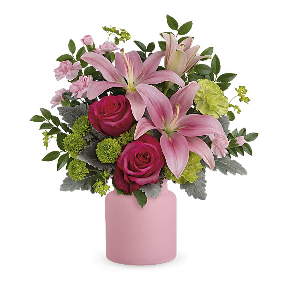 Savannah Blush Bouquet - Lush blush blooms and a charming frosted glass jar make this a pretty present they'll never forget! This bouquet includes pink asiatic lilies, hot pink roses, green carnations, miniature pink carnations, green button spray chrysanthemums, bupleurum, dusty miller and huckleberry. Delivered in The Savannah Jar.