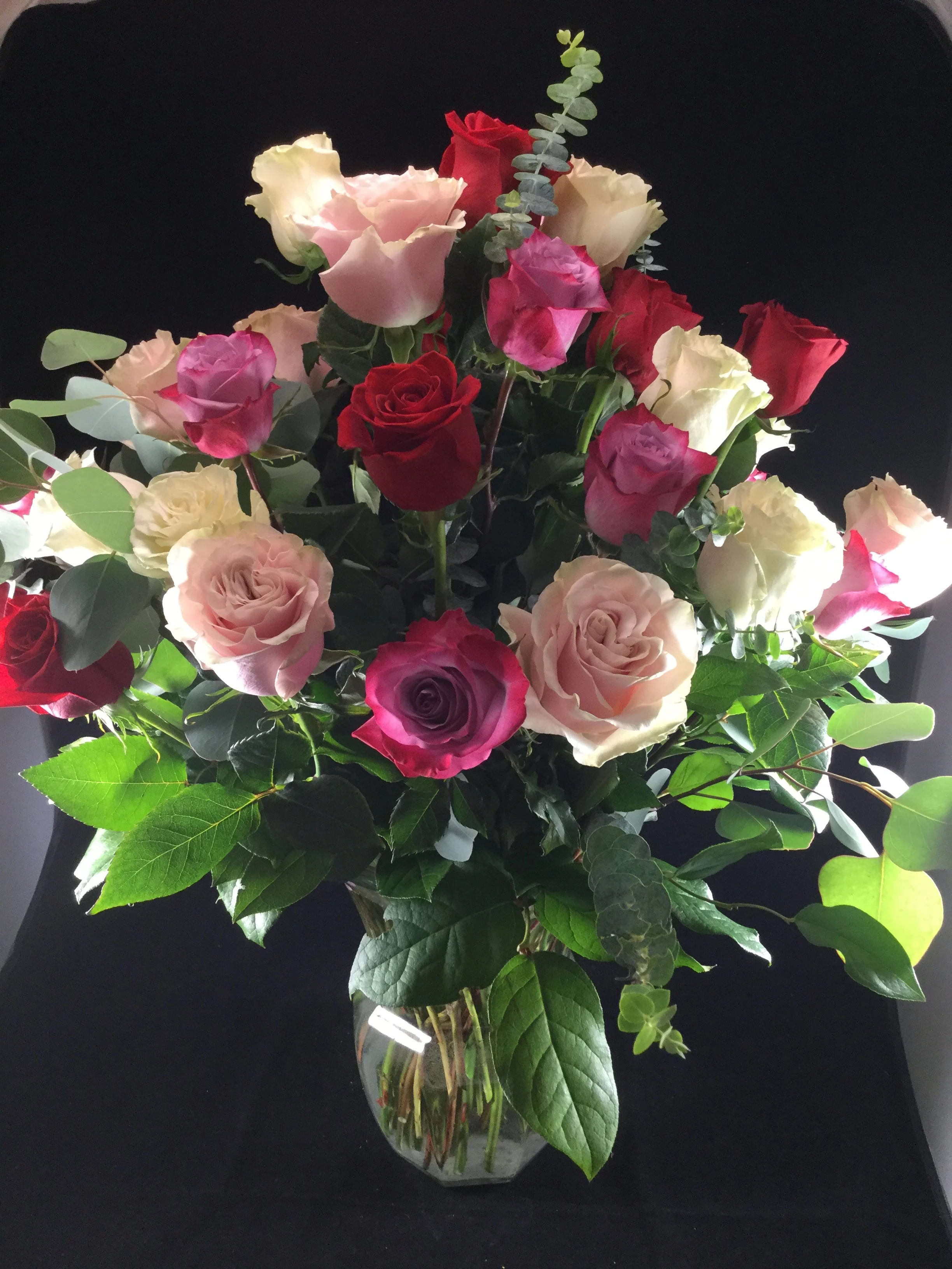 How Deep is Your Love - Two dozen mixed color premium roses, sure to bring a smile and a Wow! 