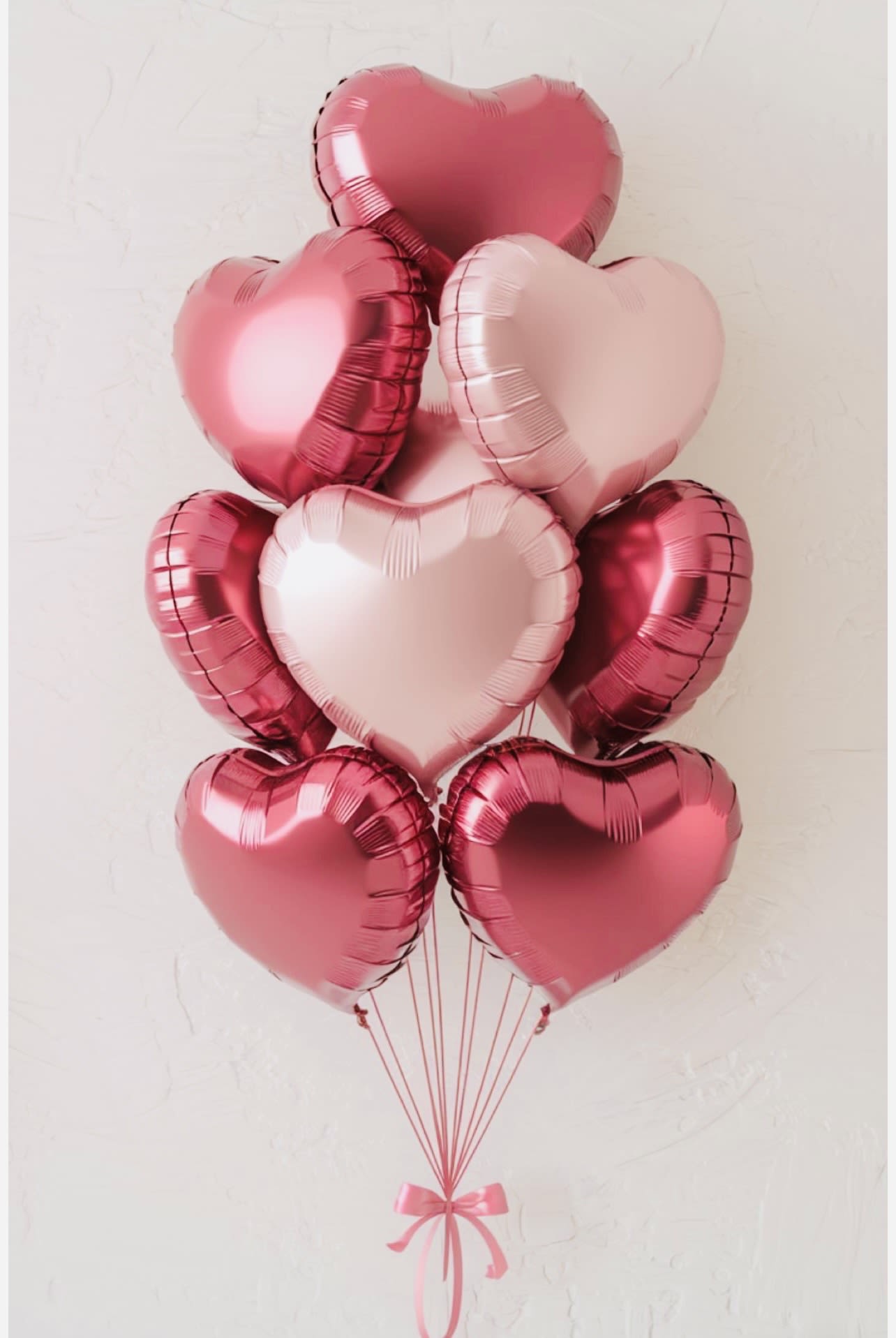 Floating with Love  - Floating With Love is a charming Valentine’s balloon arrangement designed to make hearts soar. Featuring a beautiful bunch of heart-shaped balloons, this romantic display floats gracefully to create an instant wow moment. Perfect for Valentine’s Day surprises, anniversaries, or just because, it’s a sweet and joyful way to say I love you—light, playful, and filled with romance. 