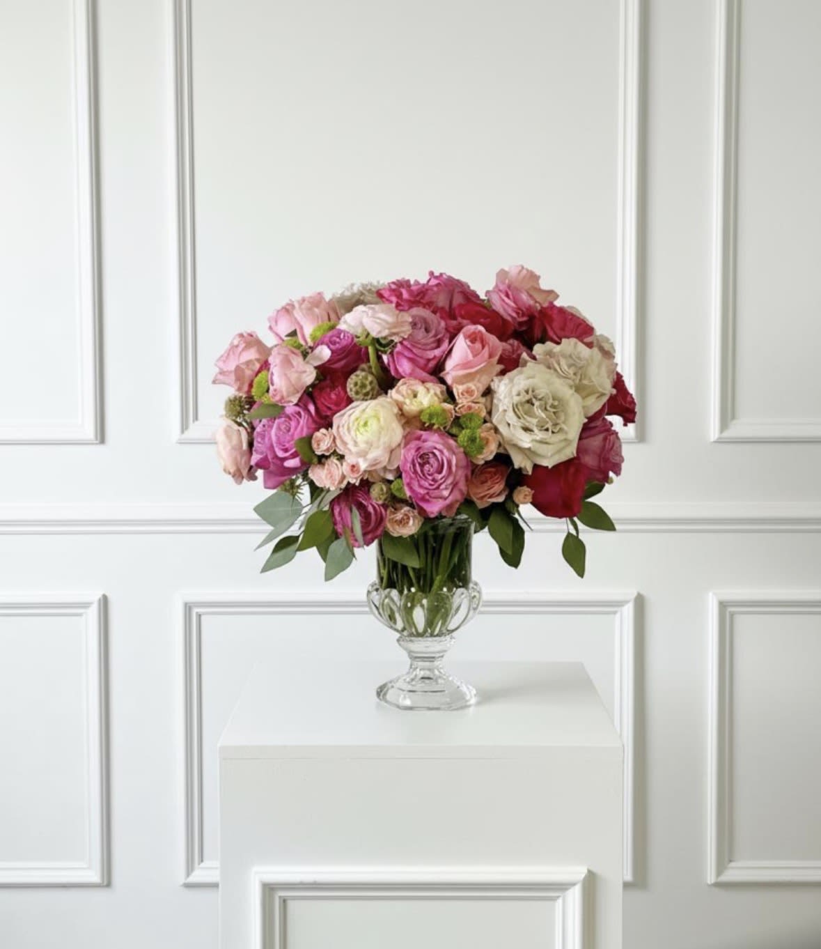 Grand Elegance - A large elegant arrangement of roses and ranunculus in shades of pink. 