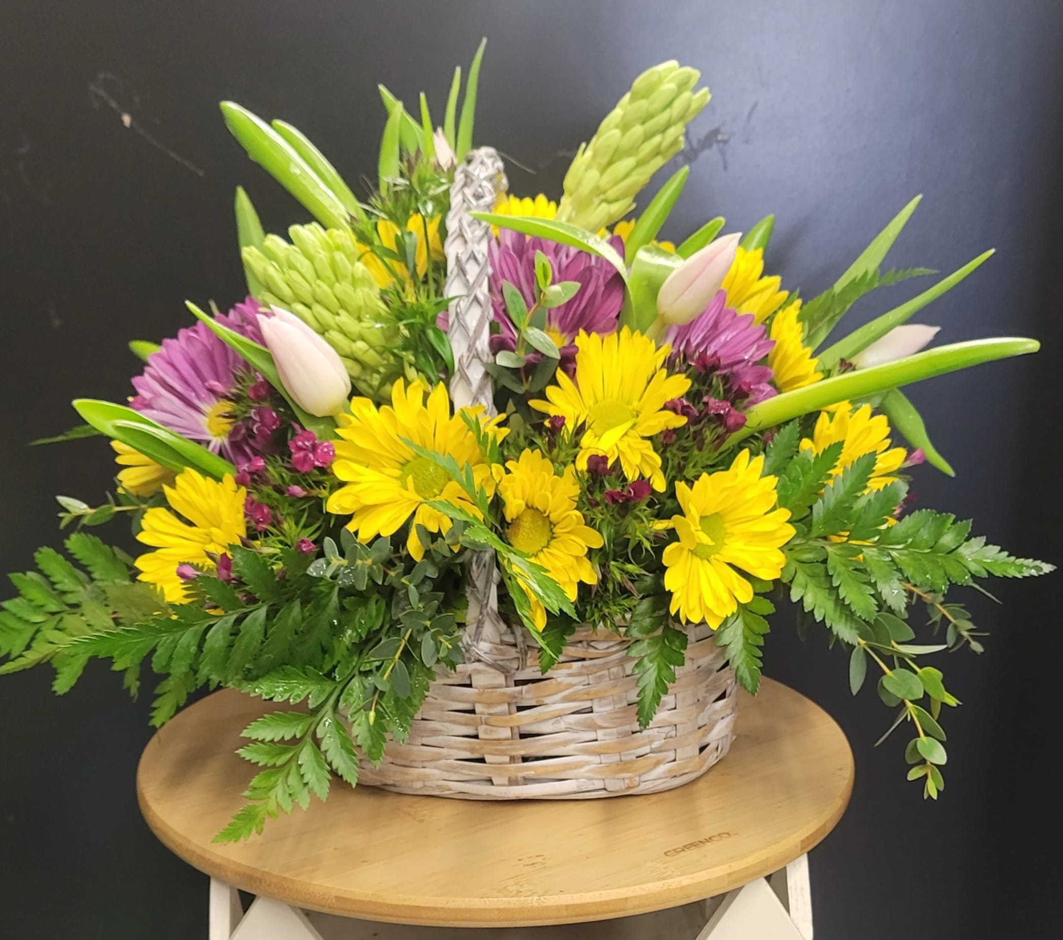 Florist Choice -  In A Basket - A basket arranged with fresh flowers that is available at the time. 