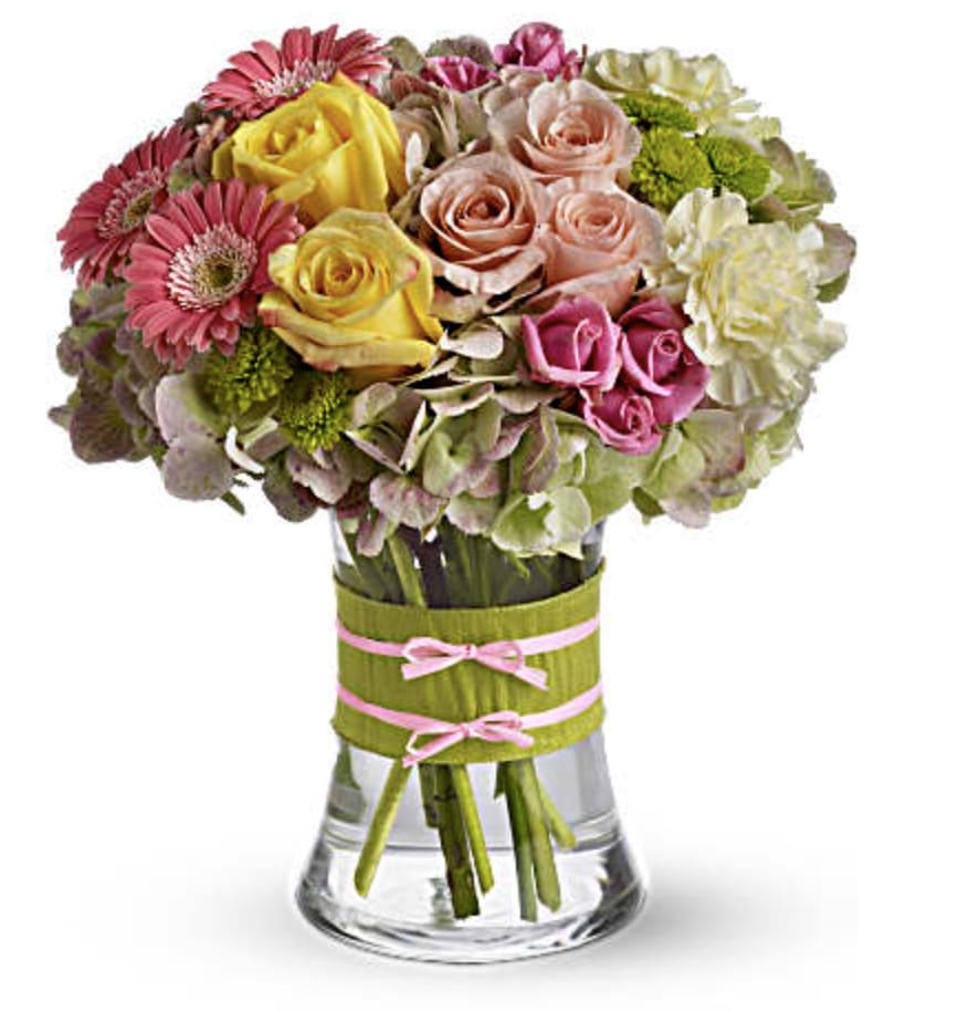 Fashionista Blooms - Flowers are always in fashion! Especially this chic mix of pinks, greens and yellows, arranged in a style evoking the English hand-tied bouquet. It's a stylish surprise for any lucky lady.