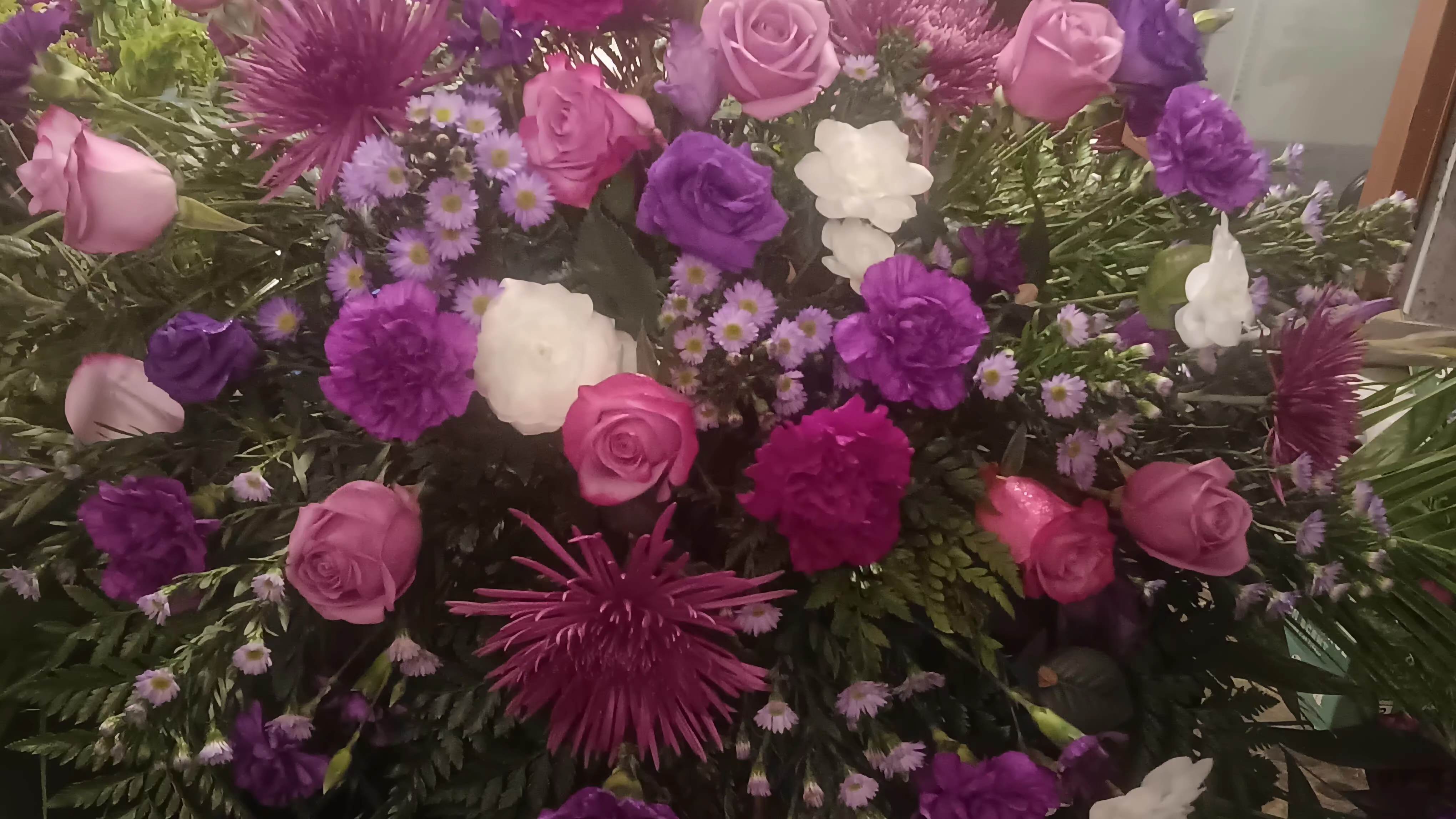 Purple and white casket spray - This beautiful casket sprays expresses the love you have for your loved one