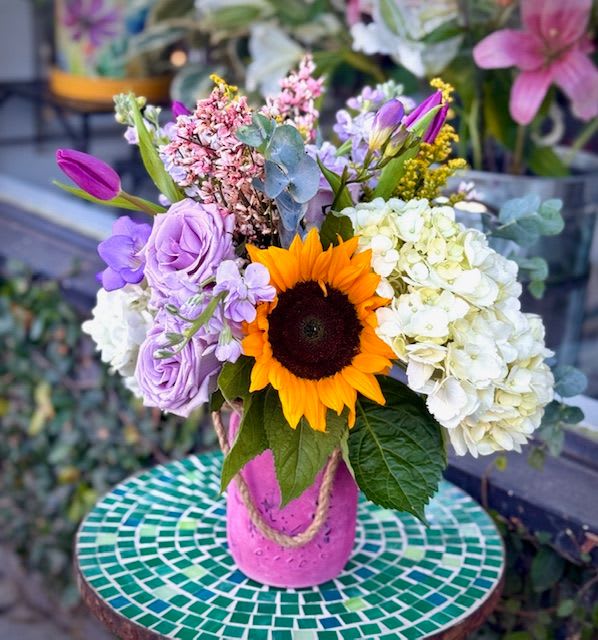 You are my sunshine - Mason jar filled with pretty pastels and one sunflower, signifying 'you are my sunshine'