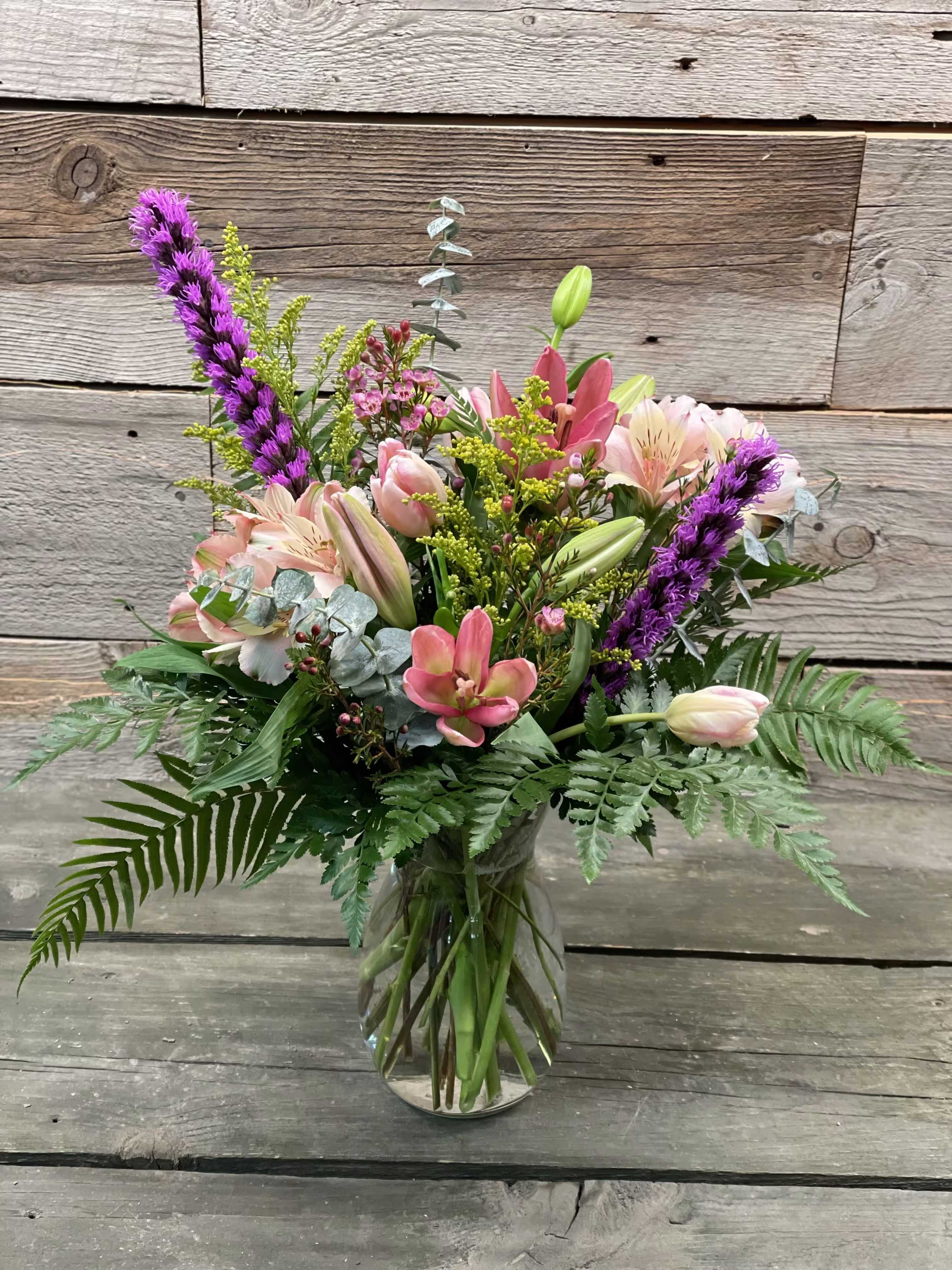 Designer's Choice - $100 (Online Special Only) - Let our designer create a beautiful arrangement with the freshest flowers of the season! (Arrangement may not look the photo)