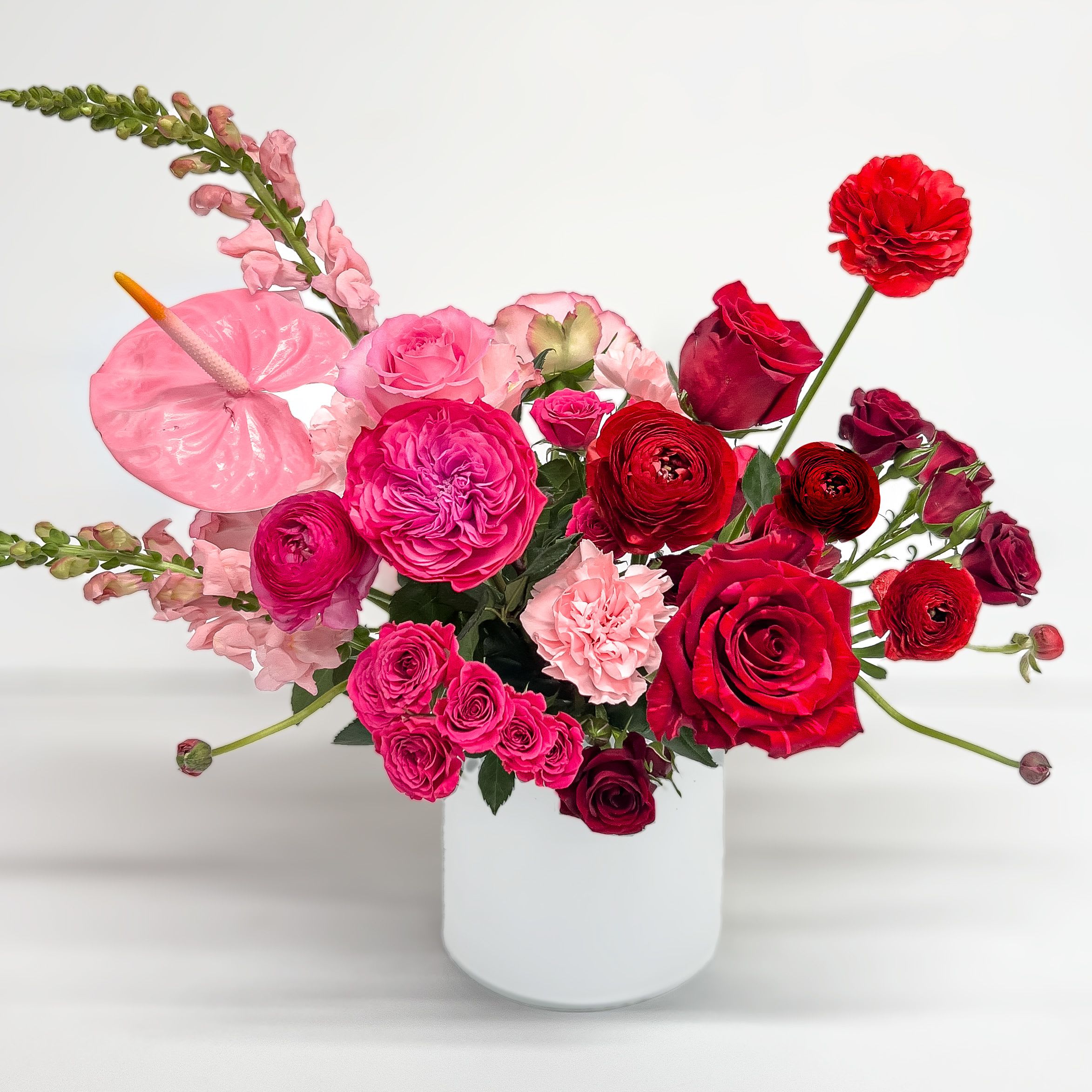 Two of Hearts - Half red, half pink, this romantic arrangement blends deep passion with gentle affection, symbolizing the perfect balance of intensity and tenderness.
