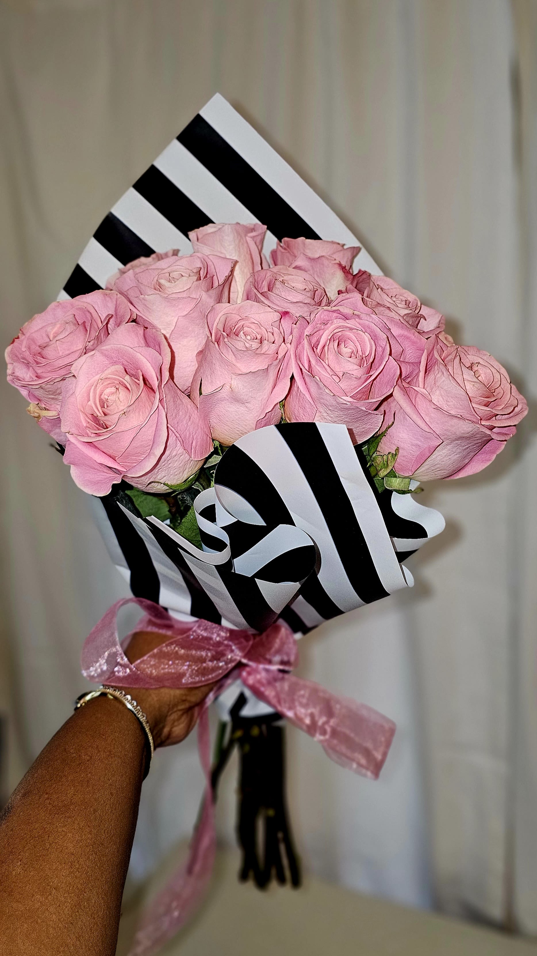 Blush Romance Rose Bouquet - A soft and romantic arrangement of blush pink roses designed to feel feminine, joyful, and heartfelt. Wrapped in our signature paper with coordinating ribbon for a polished, gift-ready finish.  Available in Dozen, 18-Stem, or Two Dozen options.