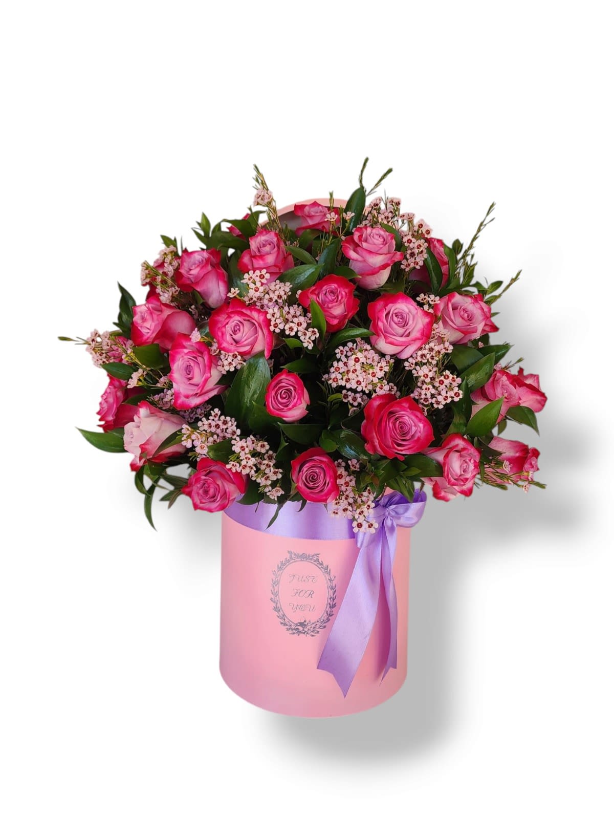  Deep Purple Sphere - A luxurious arrangement, with its intense fuchsia and pink roses, evoking femininity, admiration, and affection. These are perfectly combined with the delicate touch of small white filler flowers and lush green foliage, which add texture and freshness to the overall design.