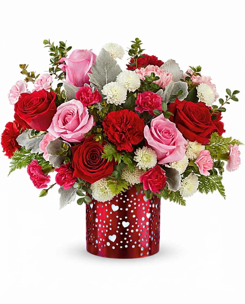 True Love  - Give your special someone visions of love with this luxurious gift of bright Flowers.  arranged in a red metal lantern adorned with charming heart and dot
