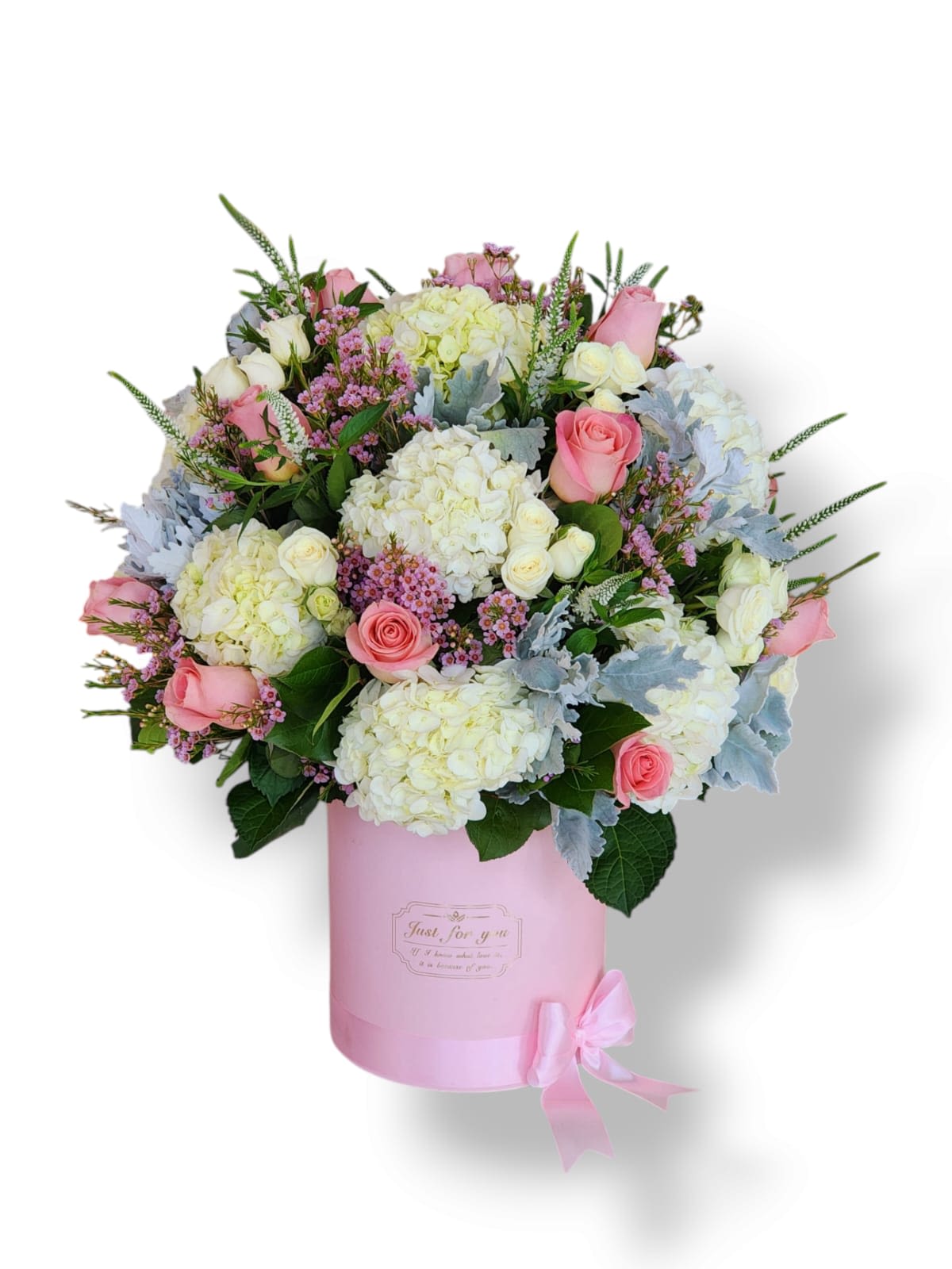Darling by Honey's Flowers - A luxurious arrangement, dominated by white and cream hydrangeas symbolizing sincerity, combined with delicate pink and white roses that evoke love and purity. Lavender accents and silvery green foliage add a touch of sophistication and freshness.