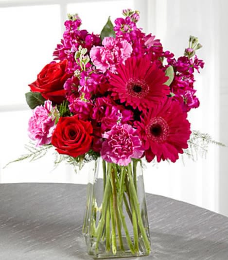 Blushes of Pink Bouquet (Style by FTD)  - Luscious hot pinks and cerise create a stunning arrangement. 