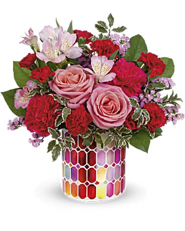 Charming Mosaic Bouquet - Charmed, I'm sure! Sweep her off her feet with this lovely bouquet of pink blooms presented in a magnificent mosaic vase of pearlescent stained glass. Pink roses, pink alstroemeria, hot pink carnations, miniature red carnations and pink sinuata statice are arranged with pitta negra and lemon leaf.