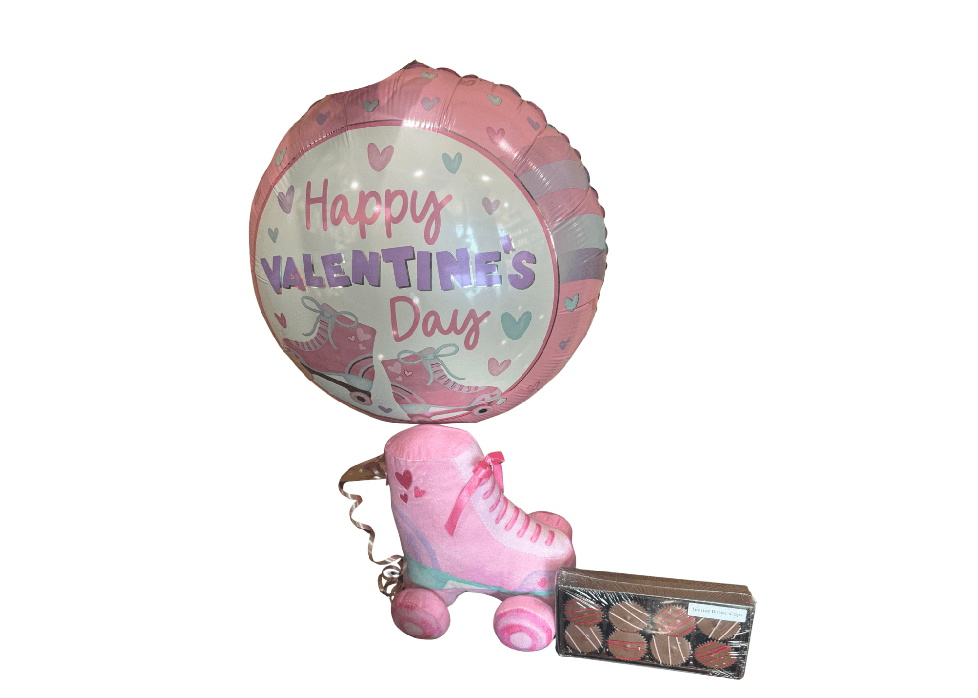 Love On Wheels - Roll into Valentine’s Day with this adorable kid-approved surprise! Our Love on Wheels gift features a sweet pink roller skate plush paired with a cheerful Valentine balloon and a box of delicious peanut butter cups! Bursting with playful charm and heart-filled details, this gift is perfect for making little faces light up on Valentine’s Day.  Whether it’s for a daughter, granddaughter, or special kiddo, this fun and festive gift is a guaranteed smile-maker—no skating skills required!