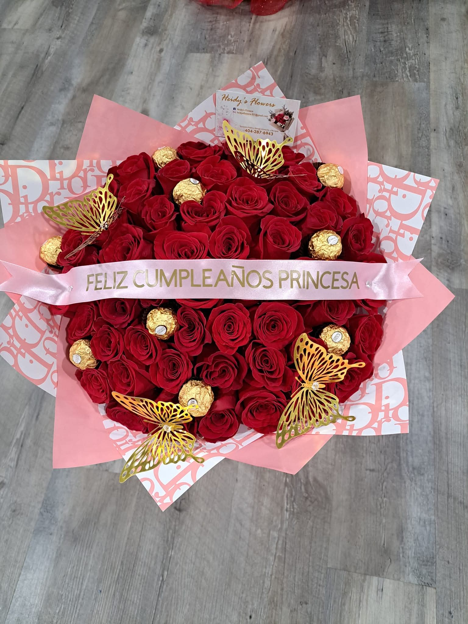 50 roses whit butterflies and  chocolate,personalized ribbon  - Red flowers wrapped whit dior paper's 