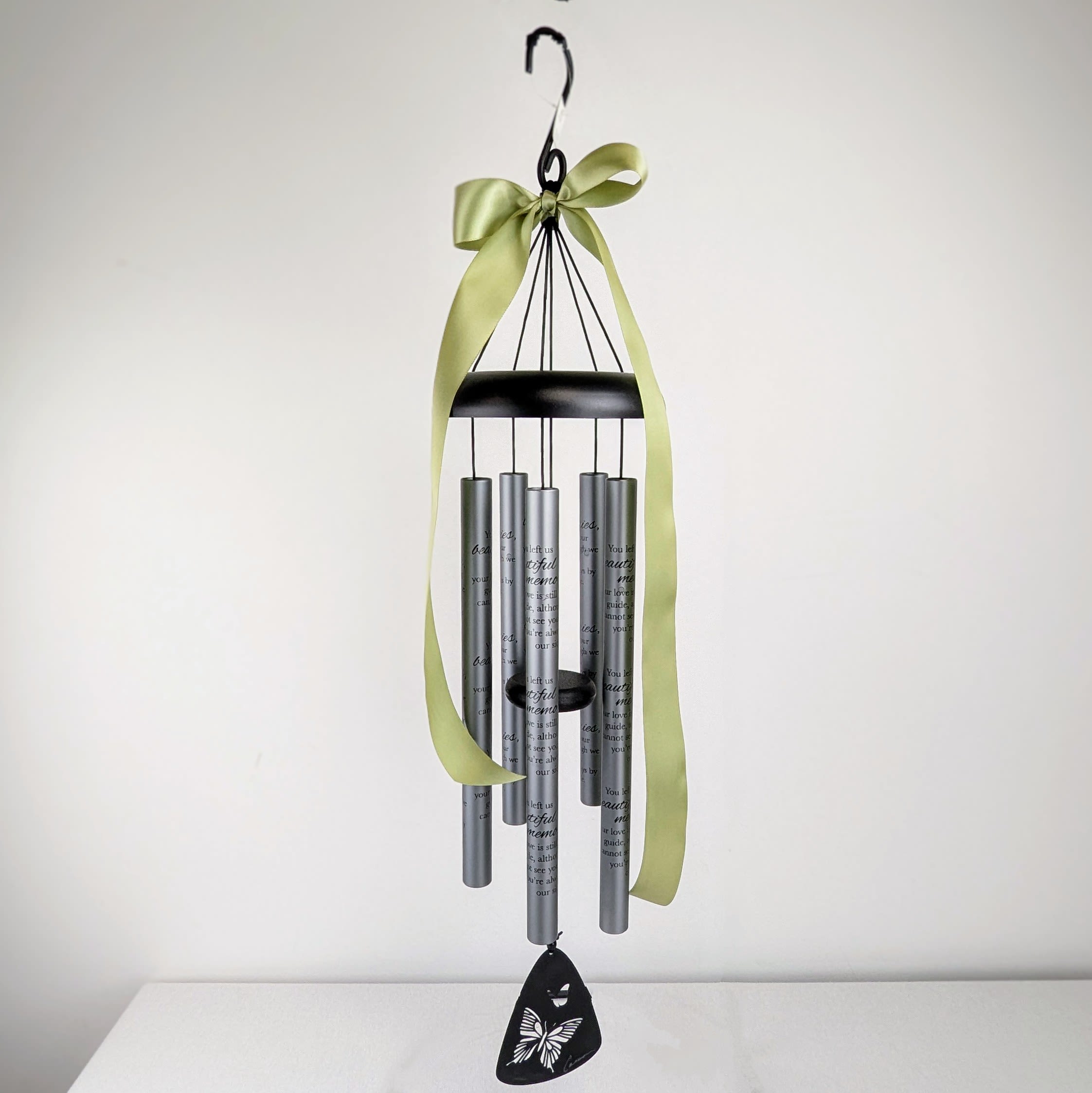 Carson Windchime "Beautiful Memories" - 30 inch Carson Sympathy Windchime  *Includes ribbon and rental stand for display  "You left us beautiful memories, your love is still our guide, although we cannot see you, you're always by our side."