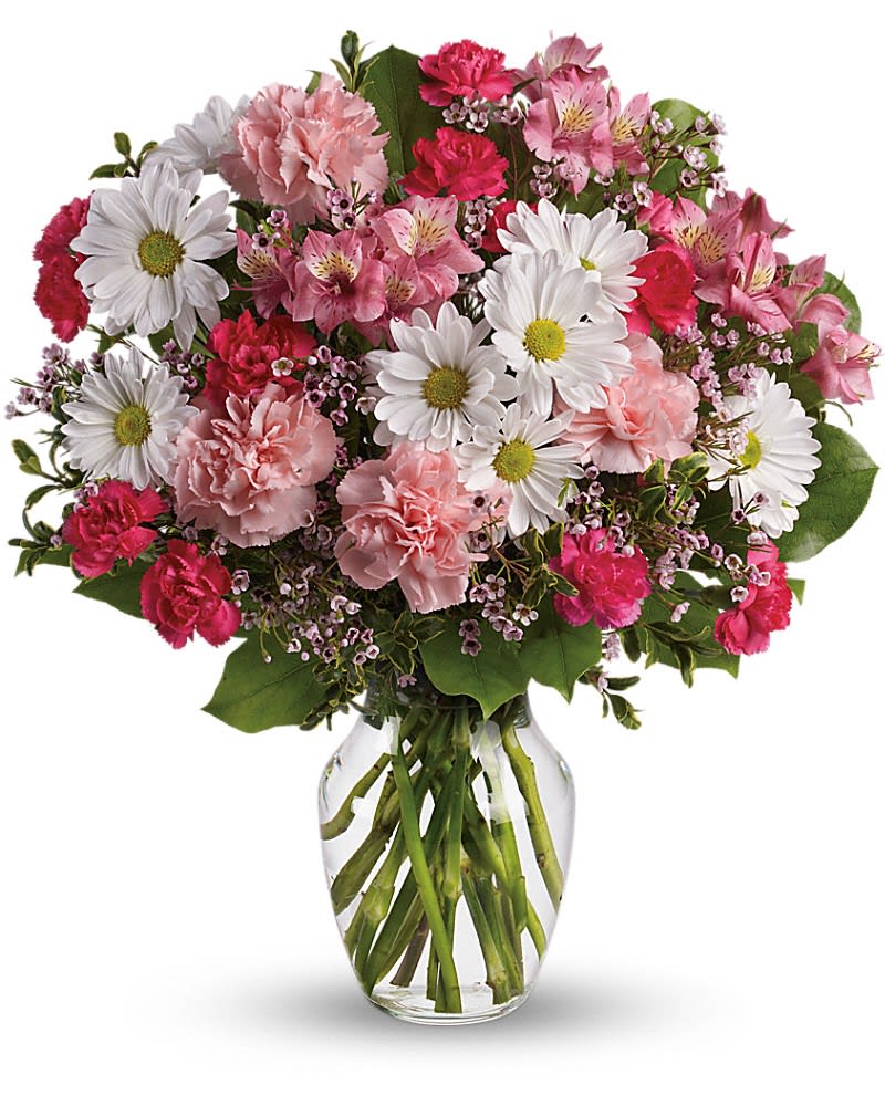 Sweet Tenderness - Let the family know they are in your thoughts and prayers with this beautiful gift of pink and white floral favorites. It will help ease their pain of loss. The beautiful bouquet includes pink alstroemeria pink carnations hot pink miniature carnations white daisy spray chrysanthemums and white waxflower accented with assorted greenery. Delivered in a clear glass rose vase.