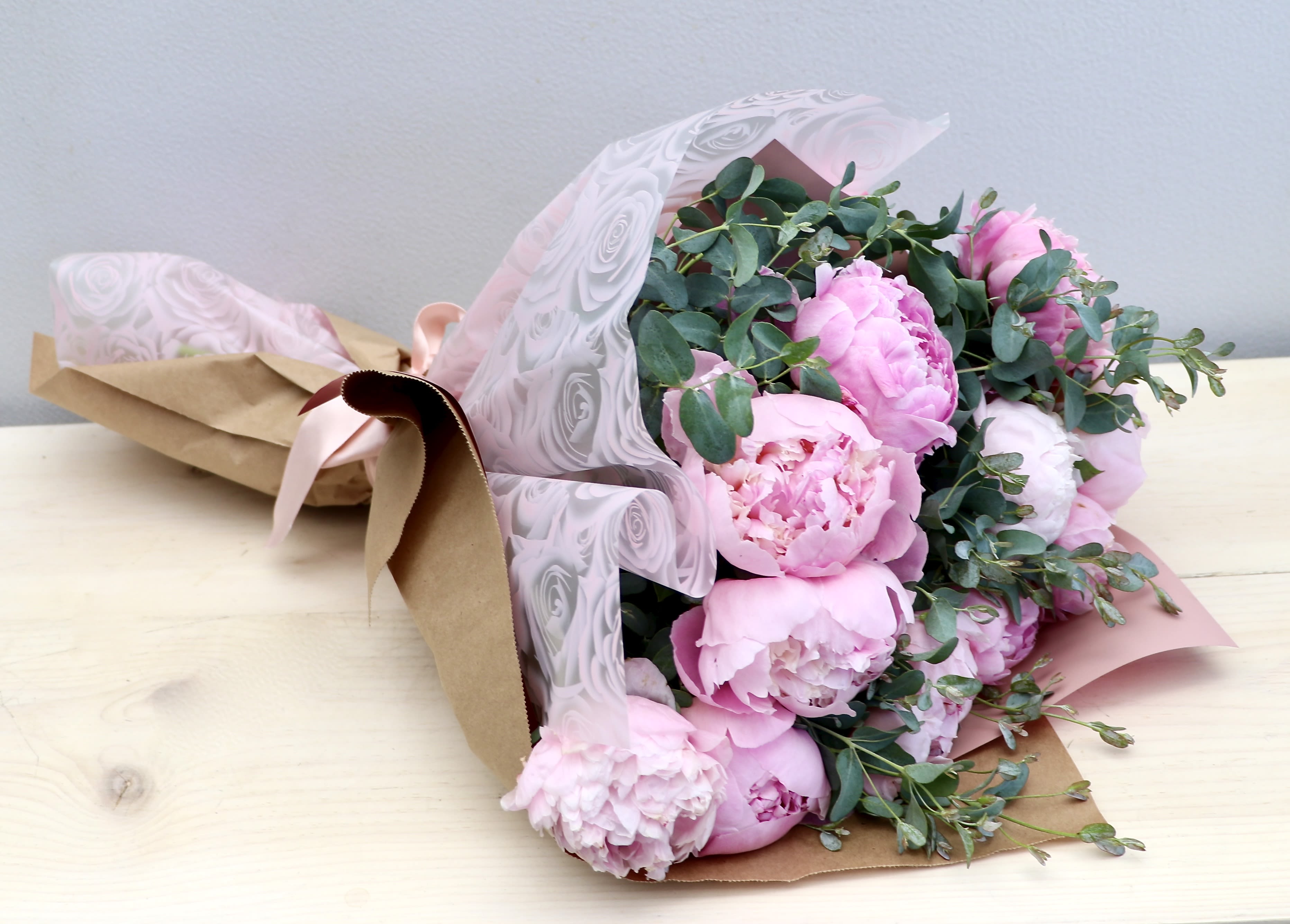 Pink Peony Bouquet - My Glendale Florist  - The standard size holds 6 peonies with seasonal greenery. The photo shown is in the DELUXE size. You can specify pick up time by texting us after placing your order (818.244.0200) or in the special instructions. All bouquets are only available for pick up. 