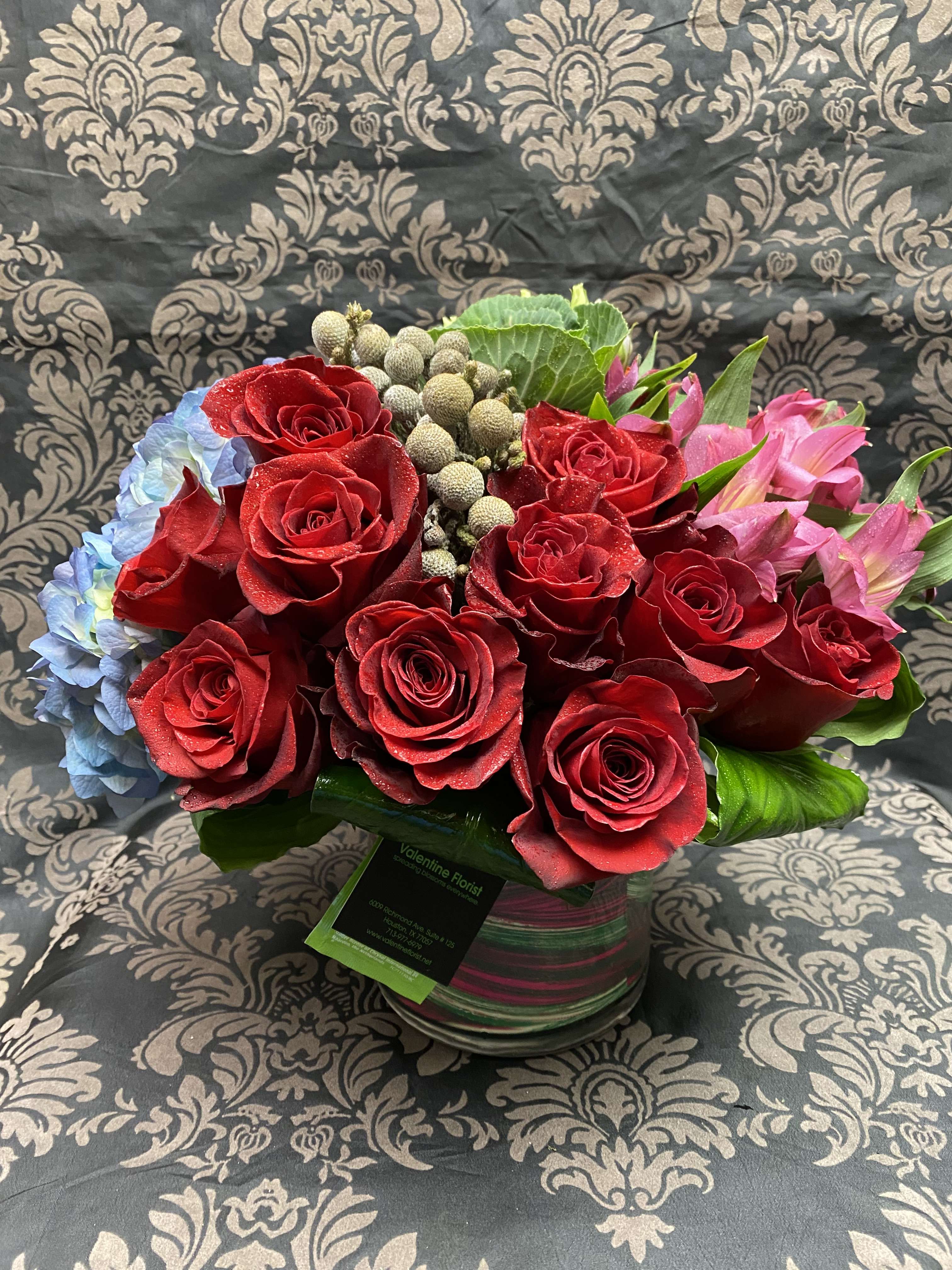 VDay Designer's Choice Mix Bouquet.  - Our best seller and customers' favorite. Let our designers design your occasion-oriented custom flowers bouquet with variety of focal blooms from our on-hand and in season inventory in a mix of colors and flowers selections. Bright, Happy, Colorful, Joyous and Fragrance are words often used to describe this collection by our customers. Most often, when given the freedom to create, the arrangement often turns out much better than we promised as it allows our creativity to shine.   Compose in a 5"x5" round clear lined glass vase on Standard. Deluxe and Premium uniquely   arranged in a cedar wooden box.