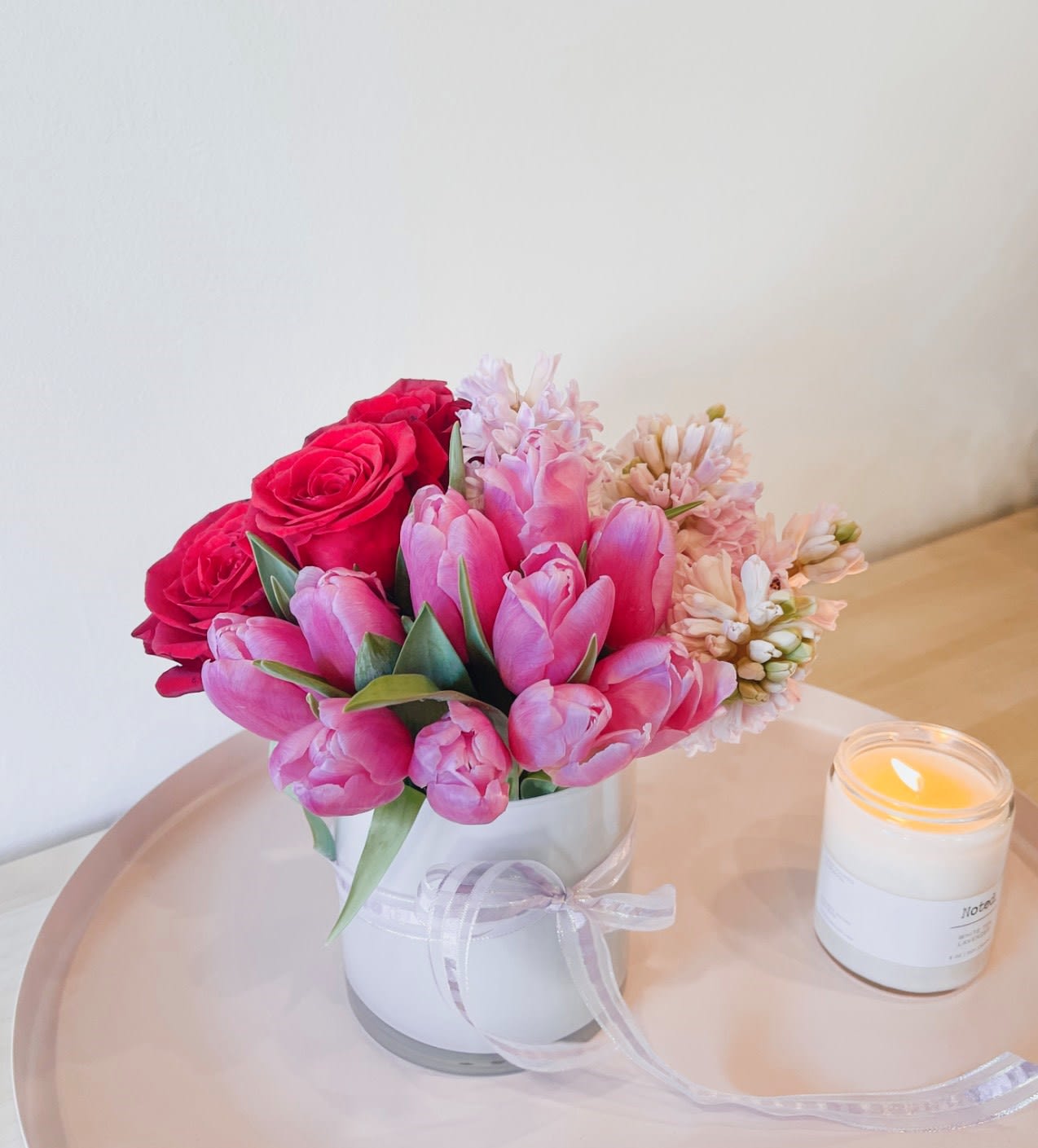 Someone to you - A Kendall Flower Shop Classic. Red roses, pink hyacinth, hot pink tulips in an elegant glass vase. 