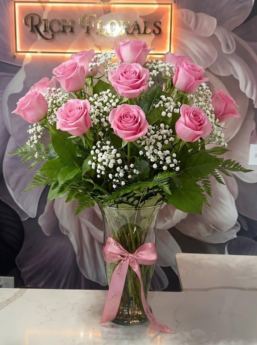 Long Stemmed Pink Roses - Standard - 1 dozen roses Deluxe - 2 dozen roses (pictured) Premium - 3 dozen roses