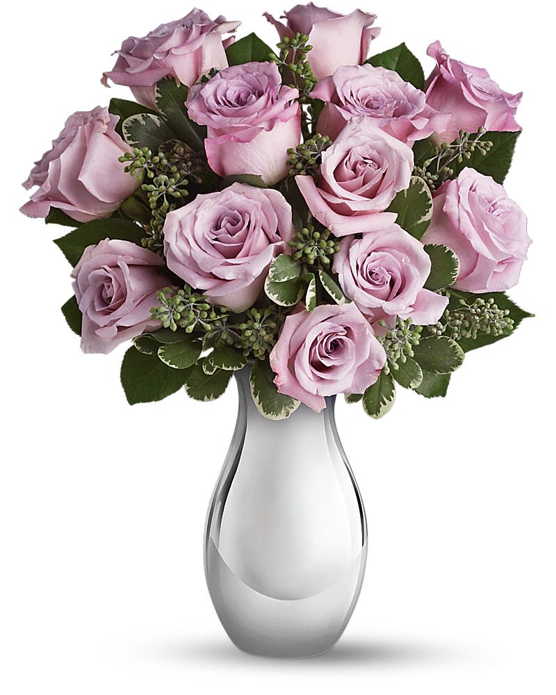 Teleflora's Roses and Moonlight Bouquet - This glorious bouquet features one dozen lush lavender roses in a sparkling Silver Reflections vase. Imagine how thrilled she'll be when this stunning gift arrives. She'll treasure the beautiful vase forever. The beautiful bouquet includes twelve lavender roses accented with assorted greenery. Delivered in Teleflora's exclusive Silver Reflections vase. (z)