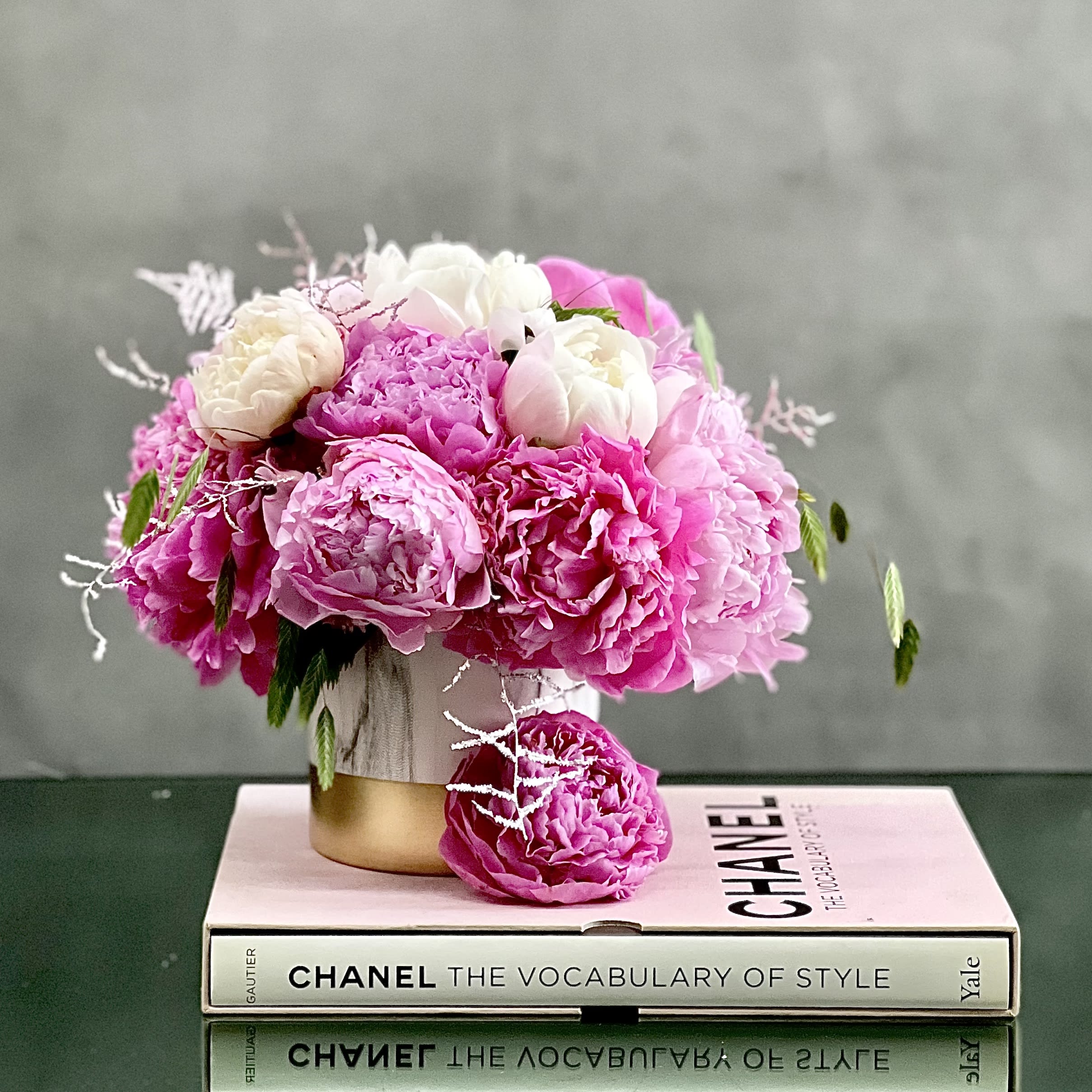 Peony Bellissimo   - Peonies layered over delicate leaves ready for same day delivery. let our Beverly hills florist design team create an arrangement that is elegant, simple, and sophisticated. 