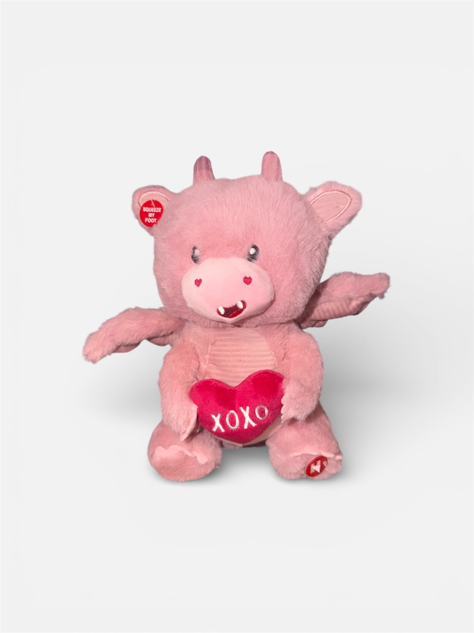 Valentines Day Dragon - Meet our enchanting light pink stuffed dragon, the perfect Valentines Day companion! This delightful dragon dances while singing "Do you Love Me". Its soft, plush exterior invites snuggles, making it an ideal gift for that special someone. Whether it's for a romantic gesture or to spread love and cheer, this whimsical dragon is sure to bring a sparkle to their eyes and warmth to their heart