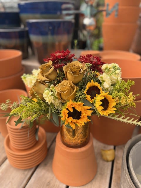 Antique Autumn - A classic fall sunflower surrounded by blooms in the autumn palette. Sure to delight!