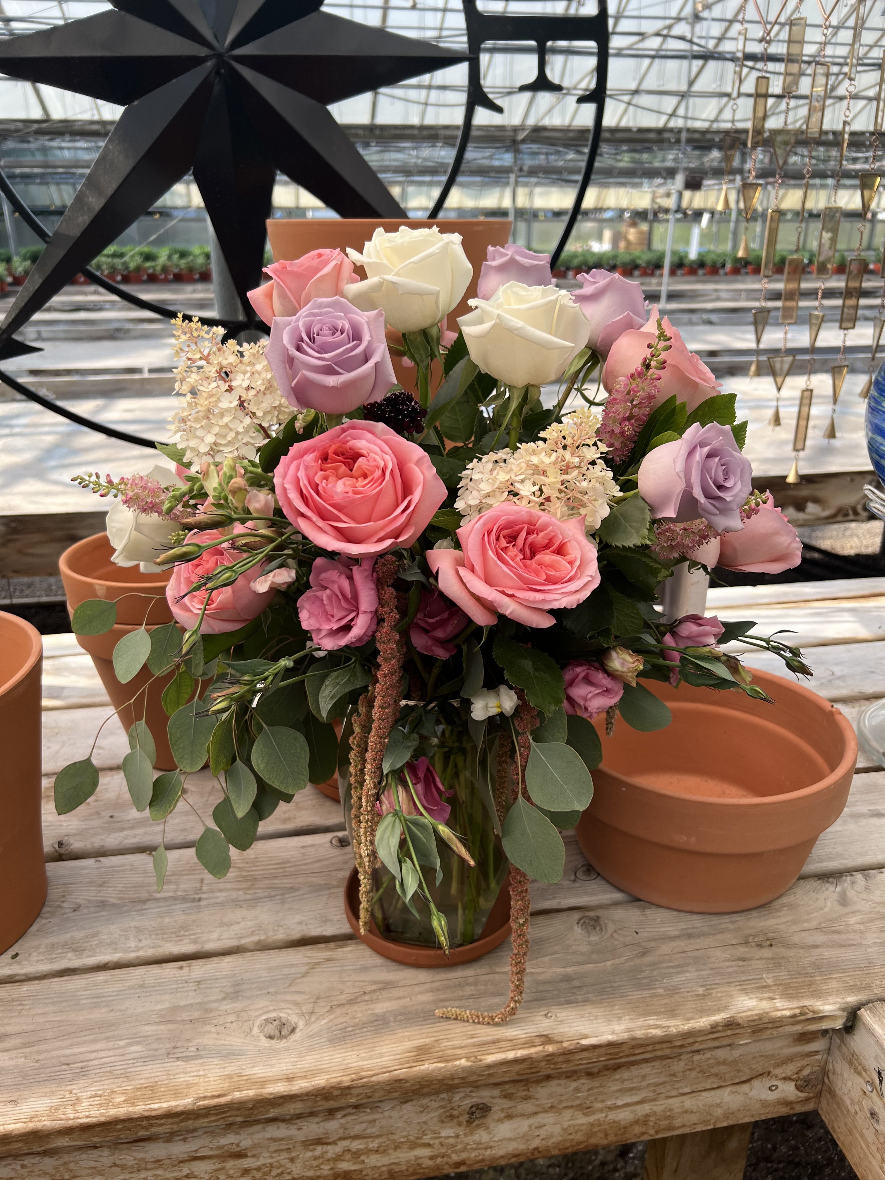 Can I Call You Rose - A mix of hydrangeas, roses and garden roses on a bed of greens