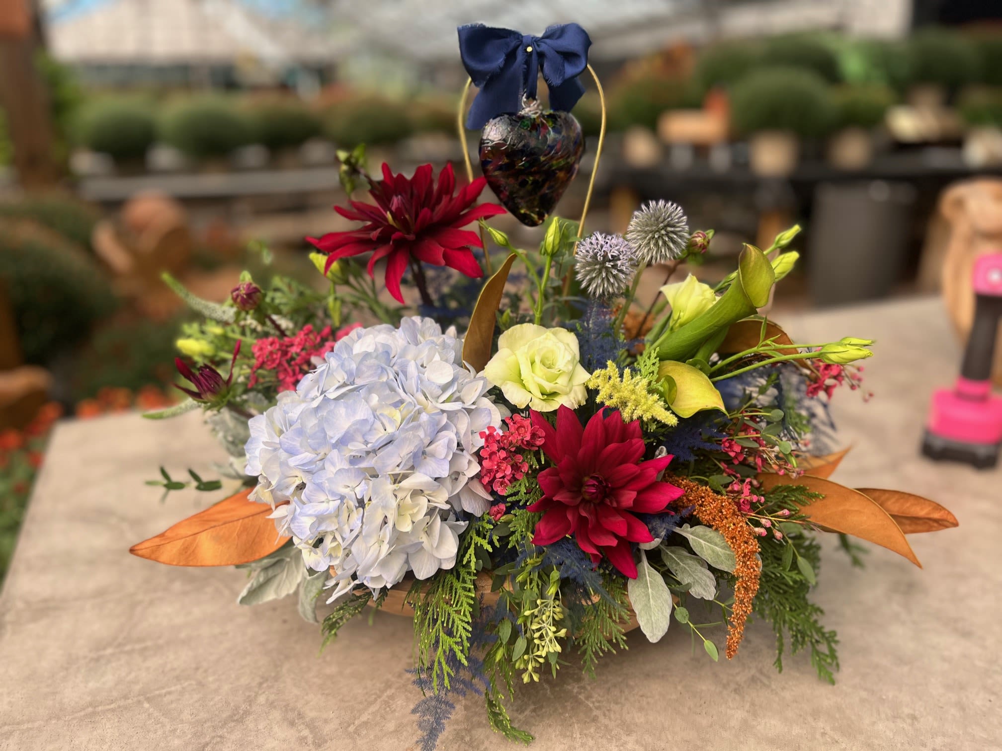 Everlasting Embrace - A graceful expression of love and remembrance. Accented with a delicate glass heart, it serves as a beautiful tribute to a life well lived and a comforting reminder of lasting memories. Designed to bring warmth, peace, and a touch of hope during times of loss.