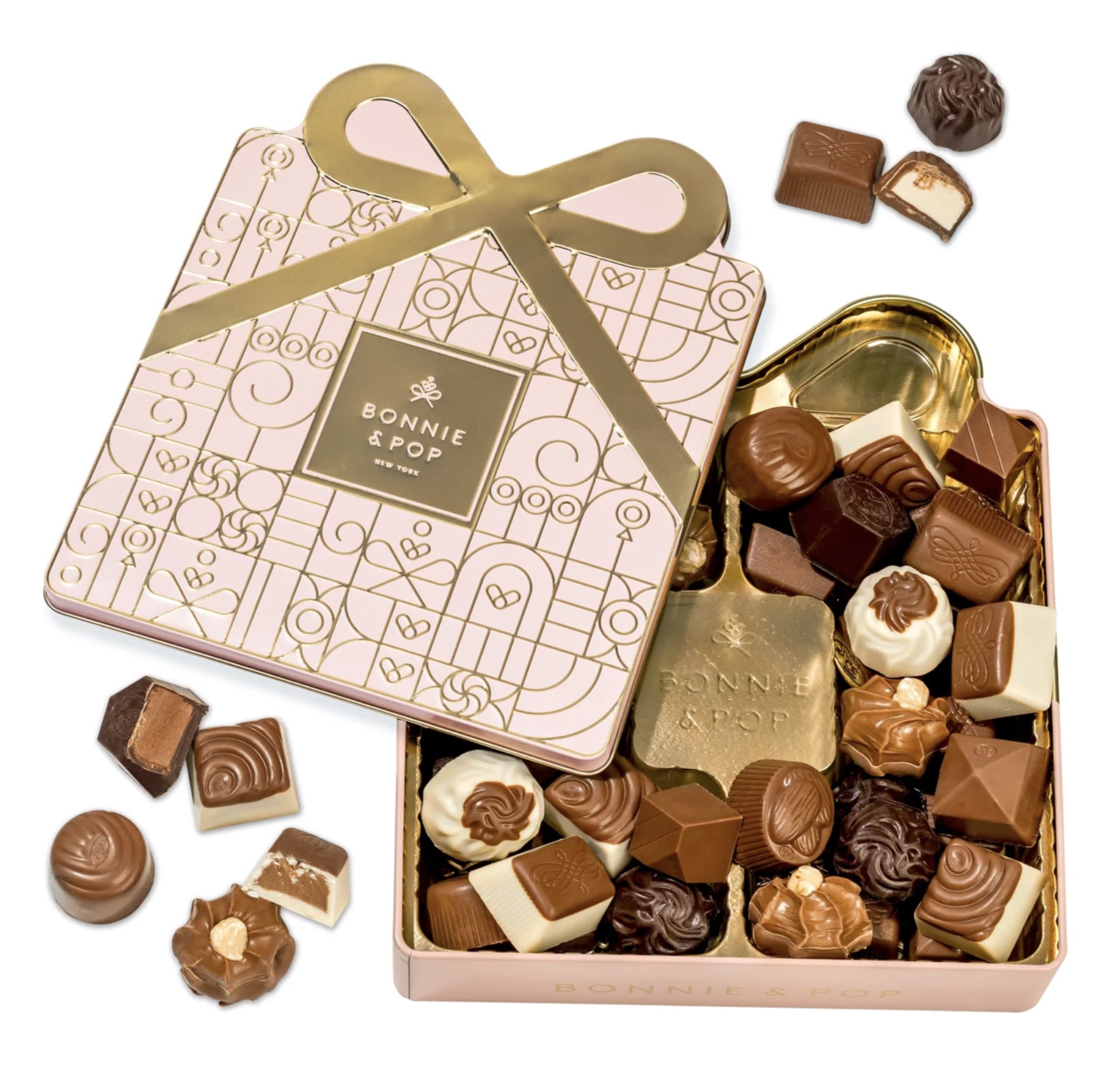 Sweet Bliss Chocolate Truffle Treasure Box -  Indulge in a luxurious selection of 24 creamy, rich truffles in milk, dark, and white chocolate varieties.   Whether you’re gifting your mom, sister, best friend, coworker, or partner, this elegant chocolate box makes a lasting impression.  Each truffle is individually wrapped and nestled inside a magnetic-closure gift box that’s just as delightful as what’s inside. Bonnie &amp; Pop NY