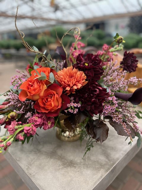 Spiced Wine - This floral arrangement is a stunning, autumn-inspired composition with a rich and dramatic color palette.