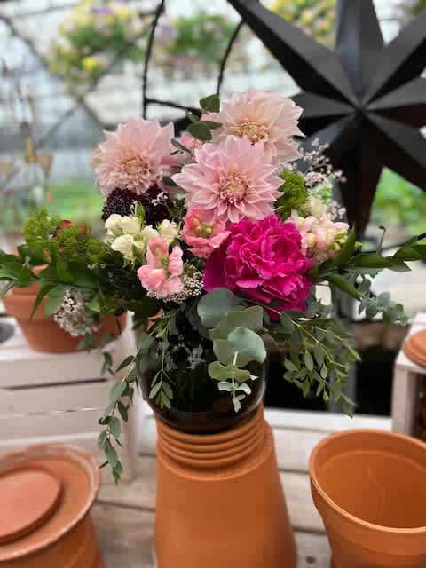 Summer Lovin - Dahlias, snap dragons, spray roses, and peonies bring this bouquet together. 